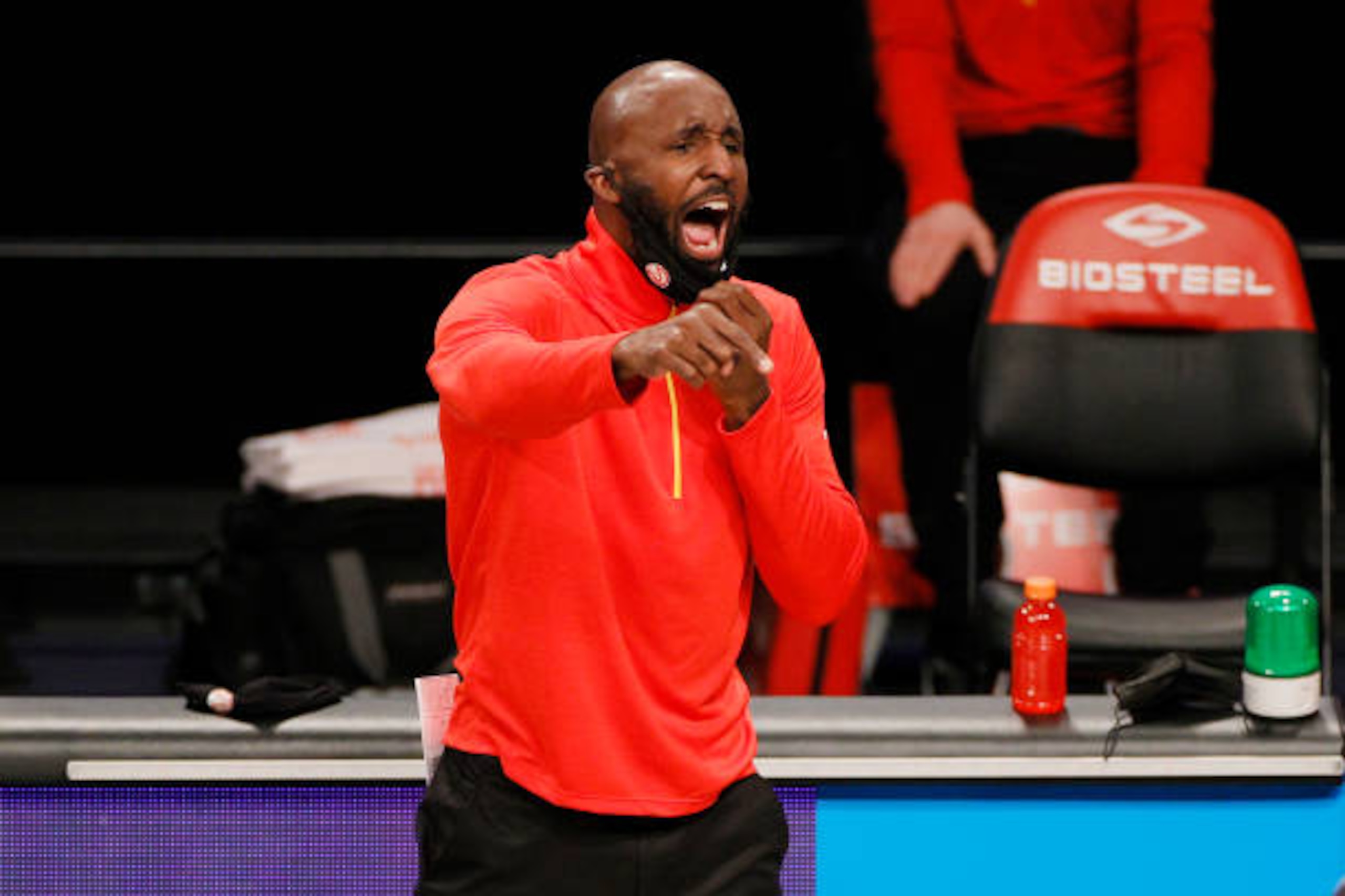 NEW YORK, NEW YORK - JANUARY 01: Head coach Lloyd Pierce of the Atlanta Hawks reacts during the first half against the Brooklyn Nets at Barclays Center on January 01, 2021 in the Brooklyn borough of New York City. NOTE TO USER: User expressly acknowledges and agrees that, by downloading and/or using this Photograph, user is consenting to the terms and conditions of the Getty Images License Agreement. (Photo by Sarah Stier/Getty Images)