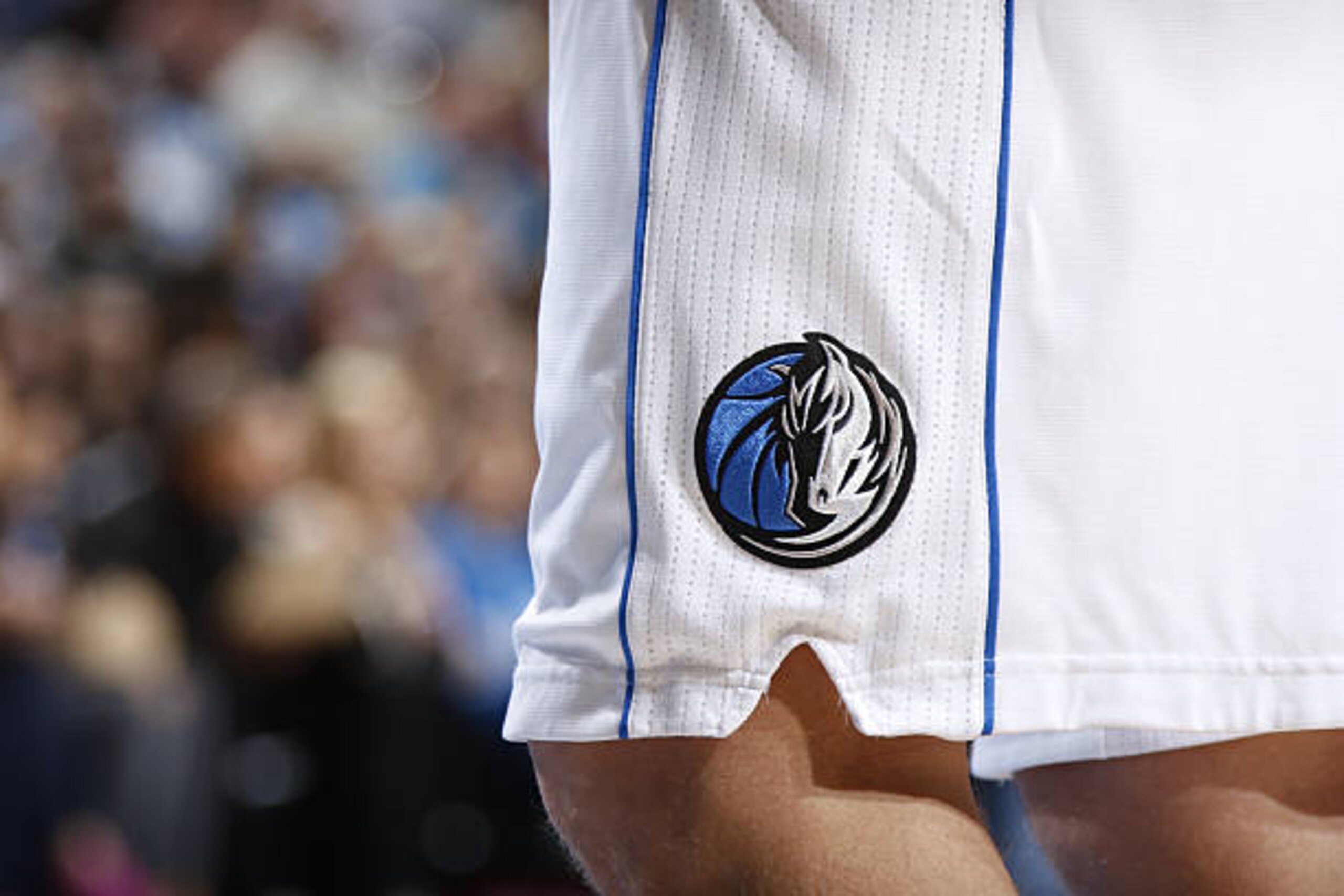 DALLAS, TX - DECEMBER 27: Close up of the Dallas Mavericks logo during the game against the Houston Rockets on December 27, 2016 at the American Airlines Center in Dallas, Texas. NOTE TO USER: User expressly acknowledges and agrees that, by downloading and or using this photograph, User is consenting to the terms and conditions of the Getty Images License Agreement. Mandatory Copyright Notice: Copyright 2016 NBAE (Photo by Danny Bollinger/NBAE via Getty Images) DALLAS, TX - DECEMBER 27: Close up of the Dallas Mavericks logo during the game against the Houston Rockets on December 27, 2016 at the American Airlines Center in Dallas, Texas. NOTE TO USER: User expressly acknowledges and agrees that, by downloading and or using this photograph, User is consenting to the terms and conditions of the Getty Images License Agreement. Mandatory Copyright Notice: Copyright 2016 NBAE (Photo by Danny Bollinger/NBAE via Getty Images)