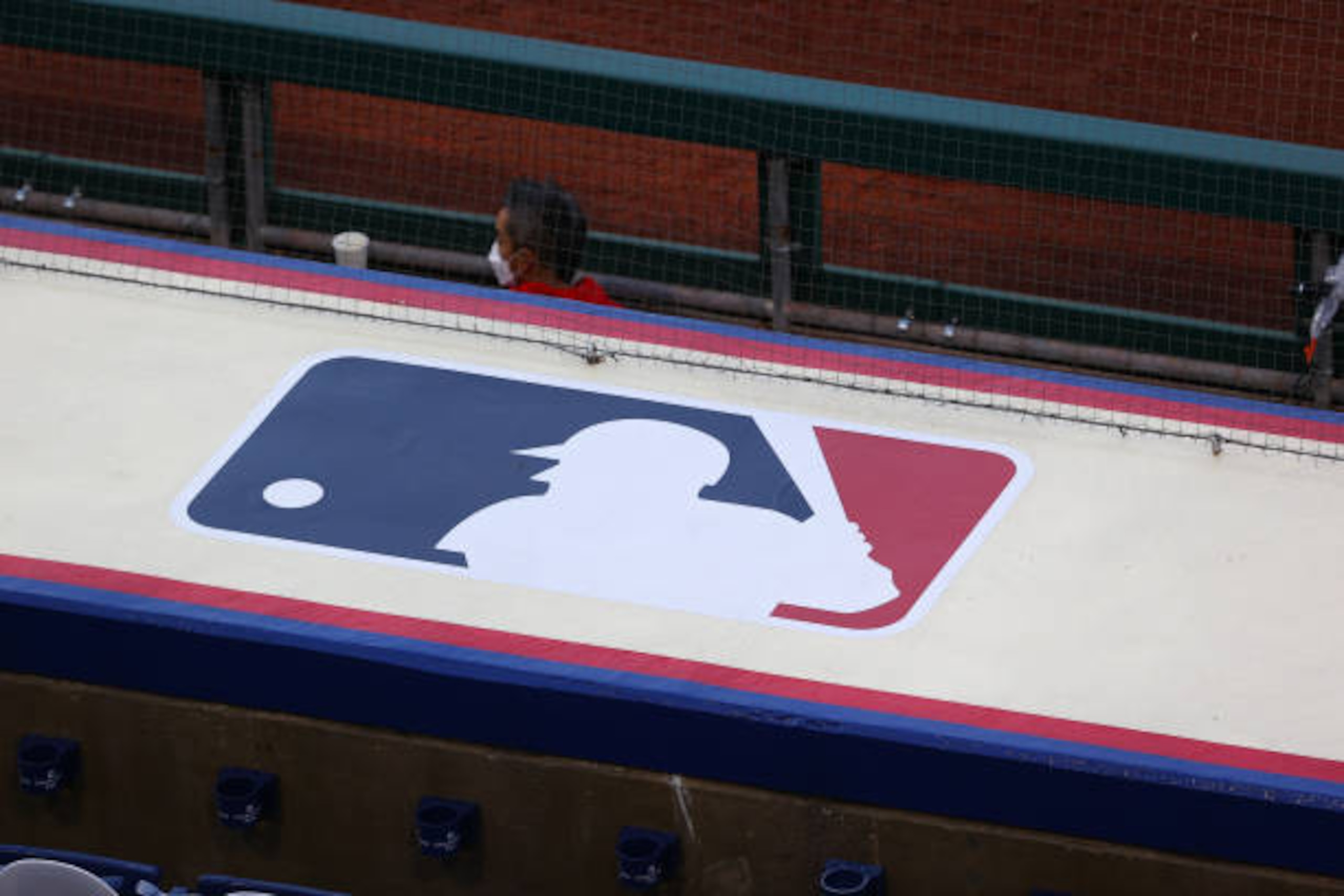 PHILADELPHIA, PA - SEPTEMBER 20: A general view of the Major League Baseball logo atop the visiting dugout during the Major League Baseball game between the Philadelphia Phillies and the Toronto Blue Jays on September 20, 2020 at Citizens Bank Park in Philadelphia, PA. (Photo by Rich Graessle/Icon Sportswire via Getty Images) PHILADELPHIA, PA - SEPTEMBER 20: A general view of the Major League Baseball logo atop the visiting dugout during the Major League Baseball game between the Philadelphia Phillies and the Toronto Blue Jays on September 20, 2020 at Citizens Bank Park in Philadelphia, PA. (Photo by Rich Graessle/Icon Sportswire via Getty Images)