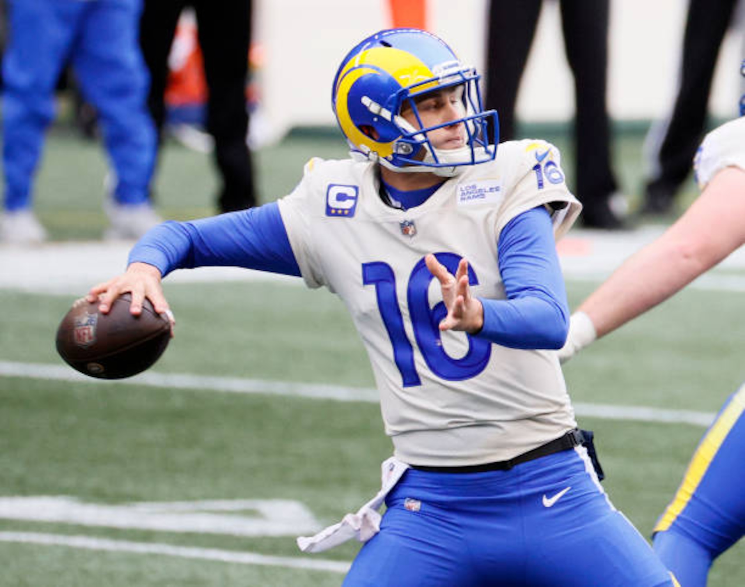 SEATTLE, WASHINGTON - JANUARY 09: Jared Goff #16 of the Los Angeles Rams looks to pass against the Seattle Seahawks during the first quarter in an NFC Wild Card game at Lumen Field on January 09, 2021 in Seattle, Washington. (Photo by Steph Chambers/Getty Images)