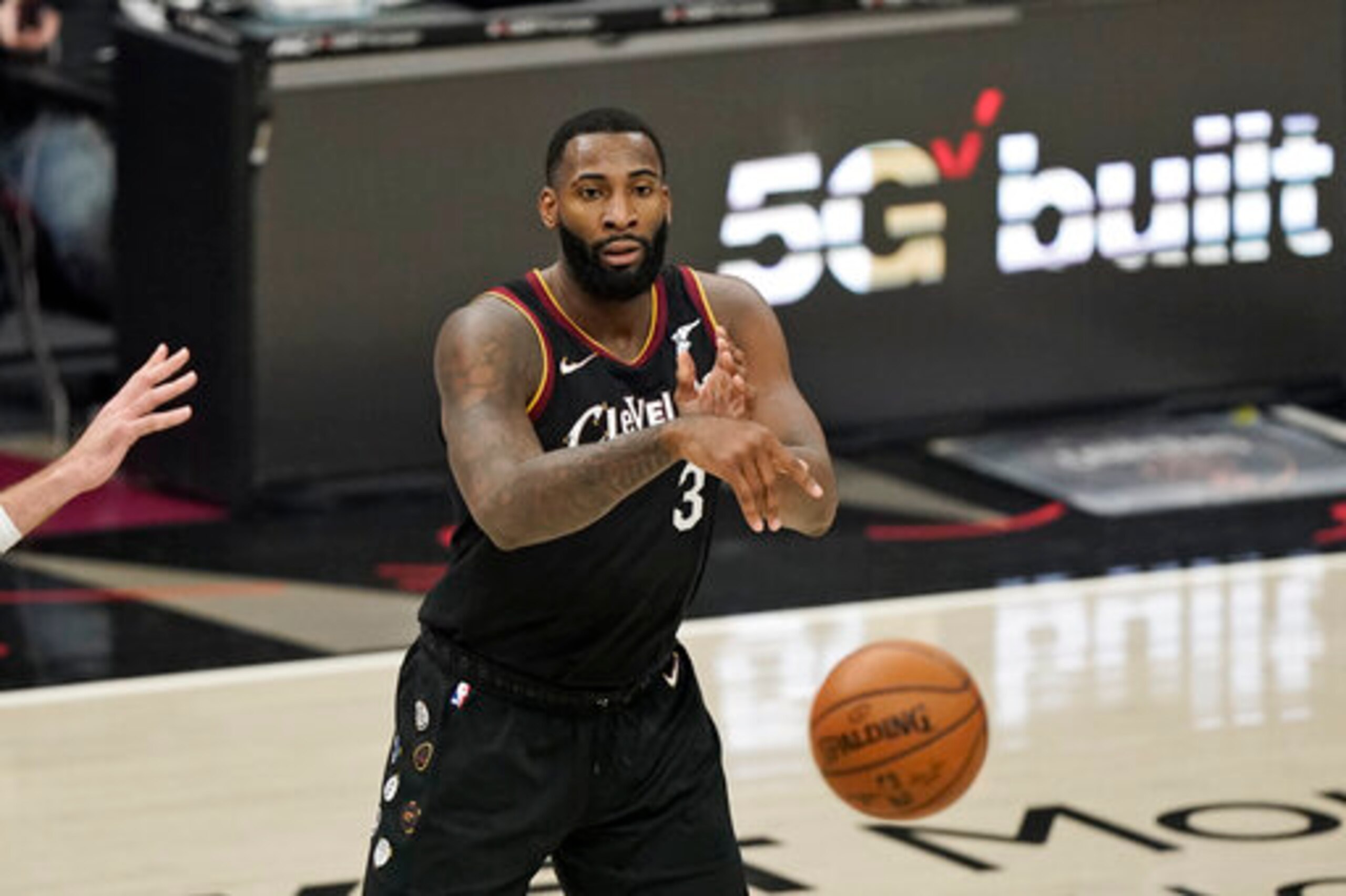 Cleveland Cavaliers' Andre Drummond passes against the Memphis Grizzlies in the second half of an NBA basketball game, Monday, Jan. 11, 2021, in Cleveland. (AP Photo/Tony Dejak) Cleveland Cavaliers' Andre Drummond passes against the Memphis Grizzlies in the second half of an NBA basketball game, Monday, Jan. 11, 2021, in Cleveland. (AP Photo/Tony Dejak)