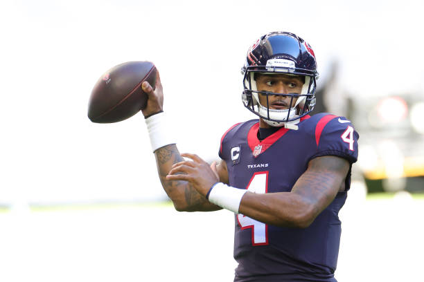 HOUSTON, TEXAS - JANUARY 03: Deshaun Watson #4 of the Houston Texans in action against the Tennessee Titans during a game at NRG Stadium on January 03, 2021 in Houston, Texas. (Photo by Carmen Mandato/Getty Images)