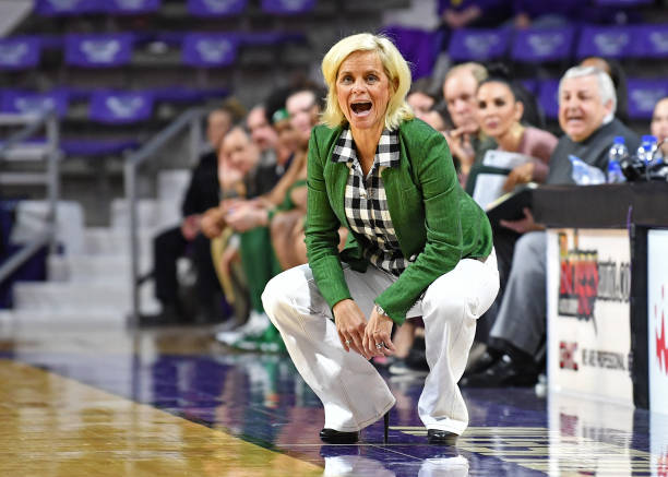 MANHATTAN, KS - FEBRUARY 08:  Head coach Kim Mulkey of the Baylor Lady Bears calls out instructions to her players during the third quarter against the Kansas State Wildcats on February 8, 2020 at Bramlage Coliseum in Manhattan, Kansas.  (Photo by Peter G. Aiken/Getty Images)