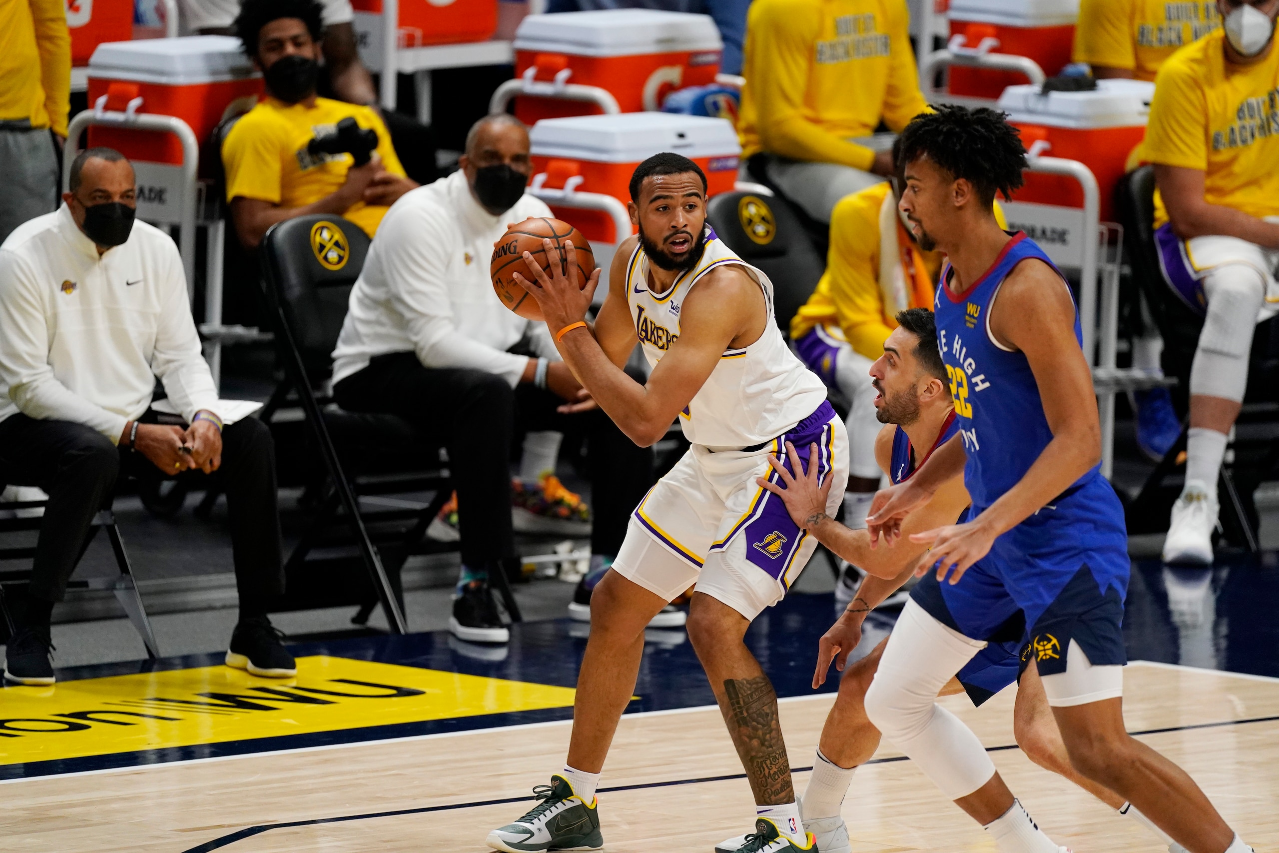 Los Angeles Lakers guard Talen Horton-Tucker (5) in the first half of an NBA basketball game Sunday, Feb. 14, 2021, in Denver. (AP Photo/David Zalubowski)