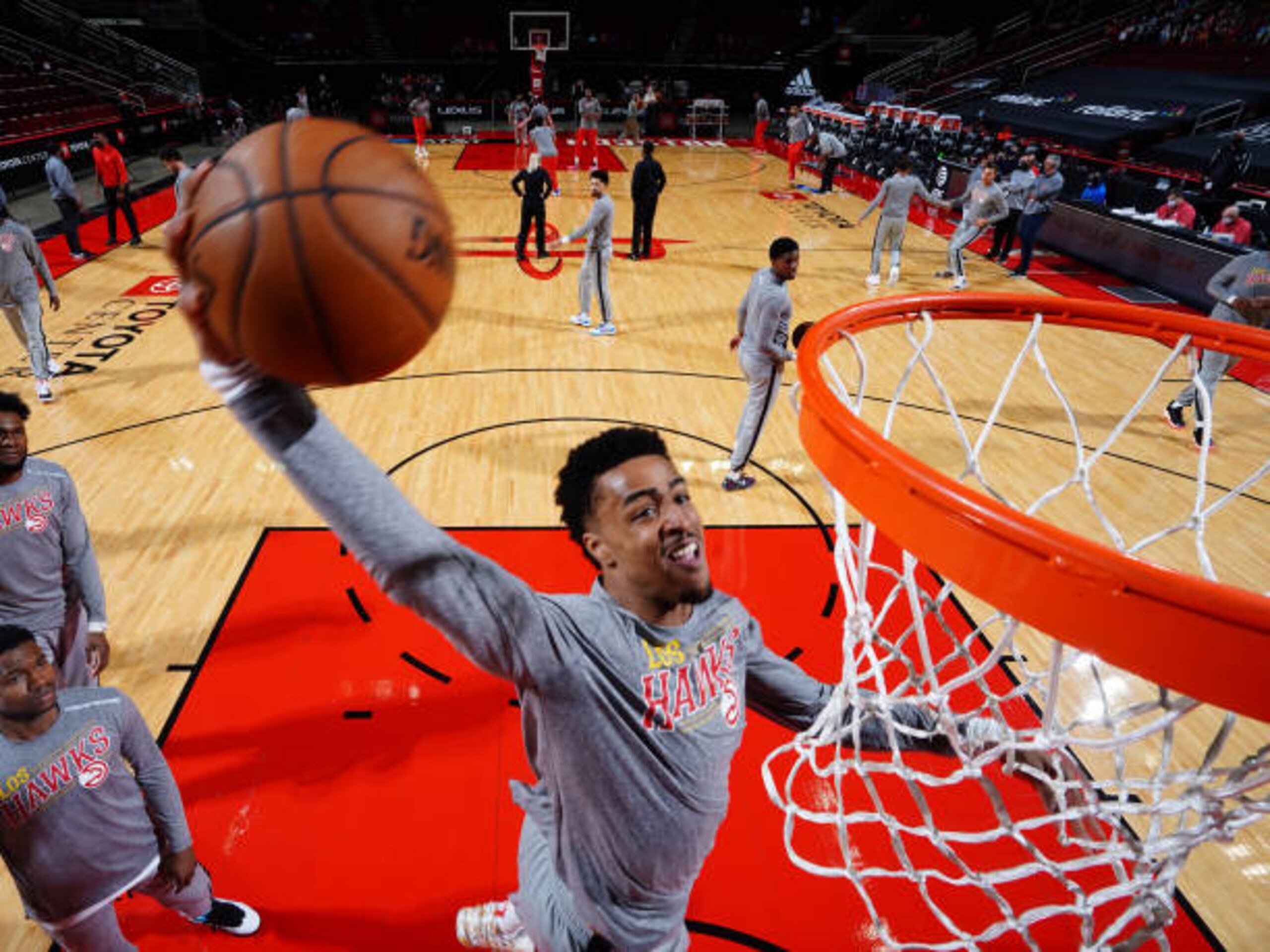 HOUSTON, TX - MARCH 16: John Collins #20 of the Atlanta Hawks dunks the ball before the game against the Houston Rockets on March 16, 2021 at the Toyota Center in Houston, Texas. NOTE TO USER: User expressly acknowledges and agrees that, by downloading and or using this photograph, User is consenting to the terms and conditions of the Getty Images License Agreement. Mandatory Copyright Notice: Copyright 2021 NBAE (Photo by Cato Cataldo/NBAE via Getty Images)