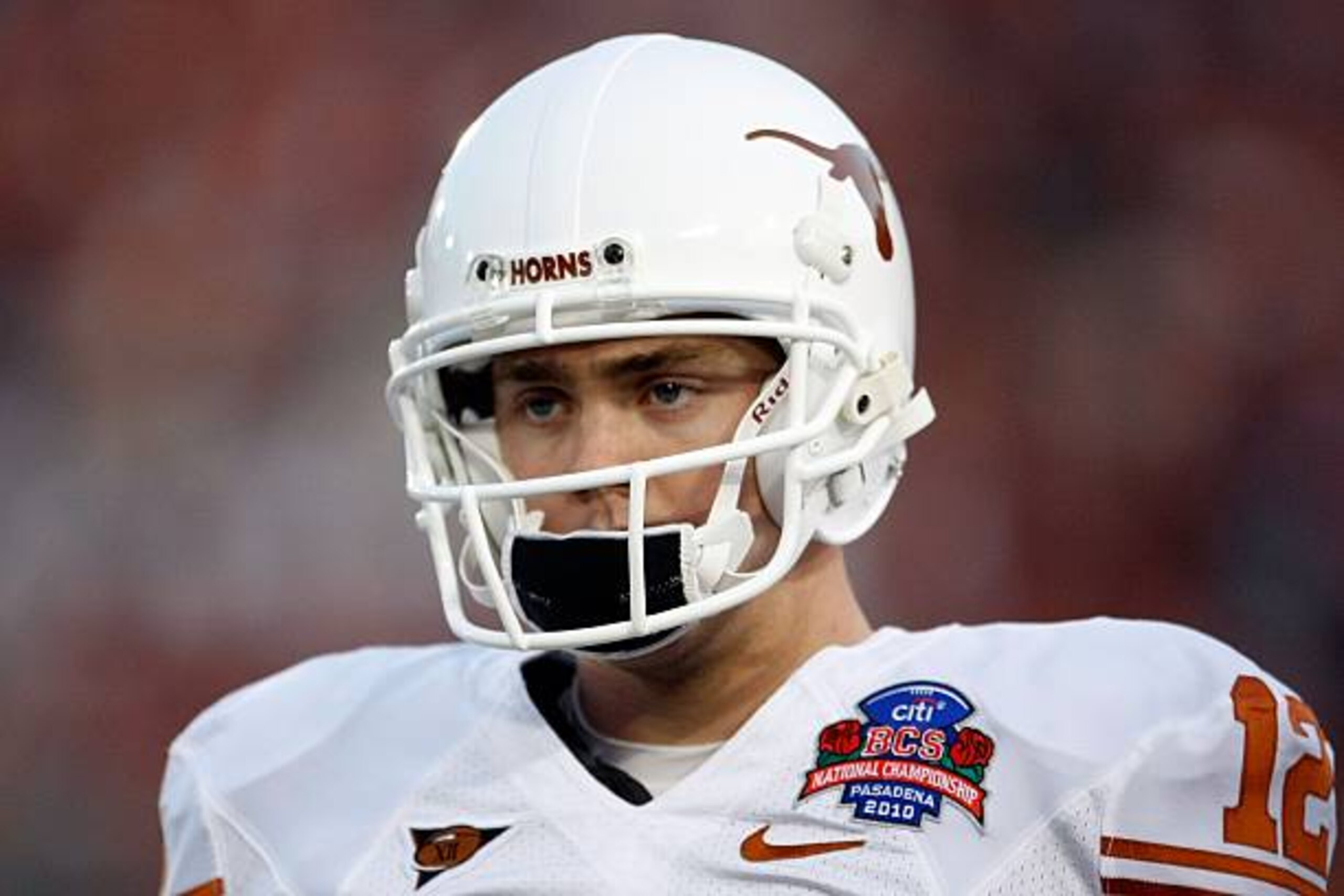 PASADENA, CA - JANUARY 07:  Quarterback Colt McCoy #12 of the Texas Longhorns looks on before taking on the Alabama Crimson Tide in the Citi BCS National Championship game at the Rose Bowl on January 7, 2010 in Pasadena, California.  (Photo by Jeff Gross/Getty Images)