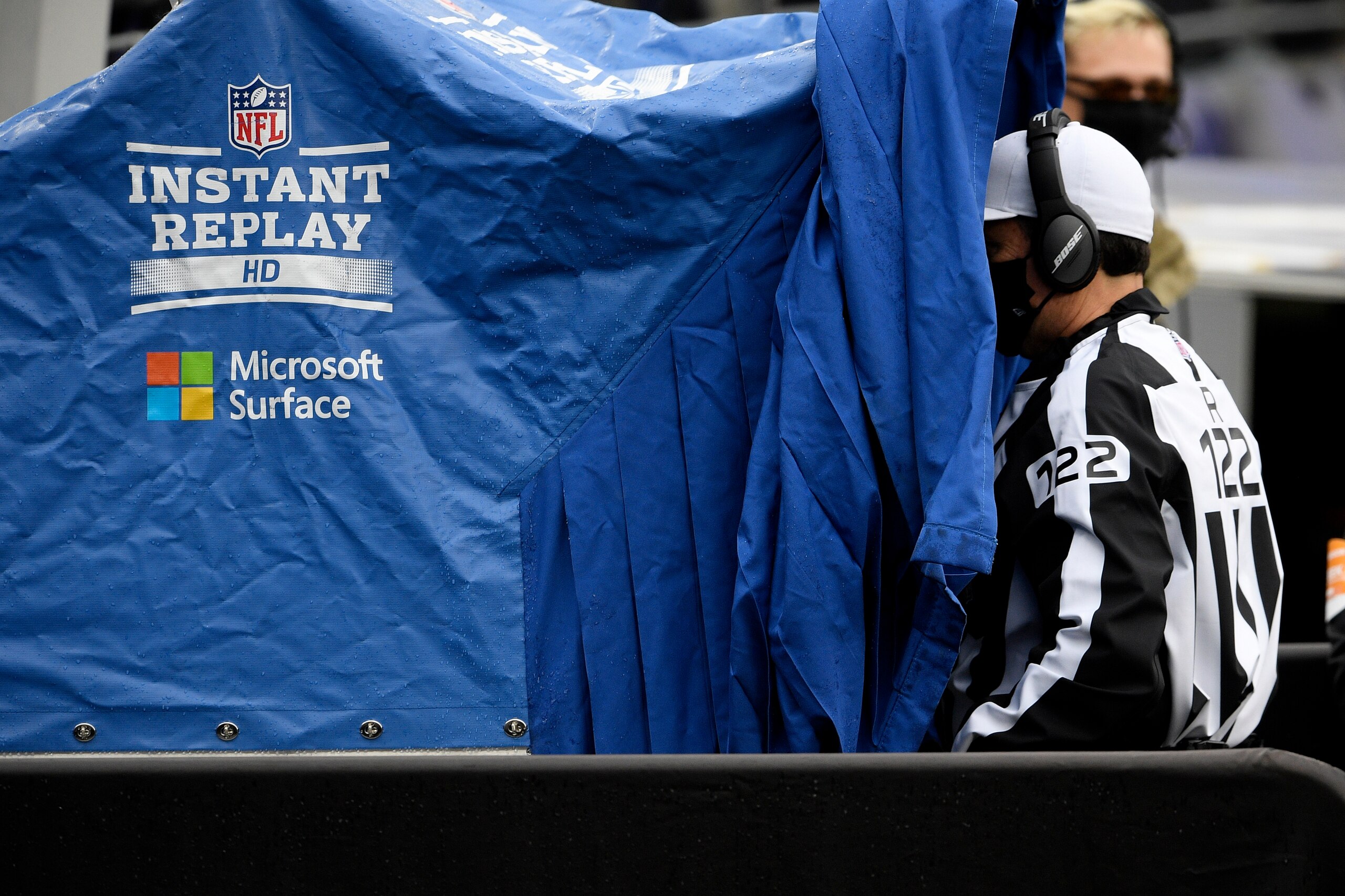 An official uses the instant replay booth to review a play during the first half of an NFL football game between the Pittsburgh Steelers and the Baltimore Ravens, Sunday, Nov. 1, 2020, in Baltimore. (AP Photo/Nick Wass)