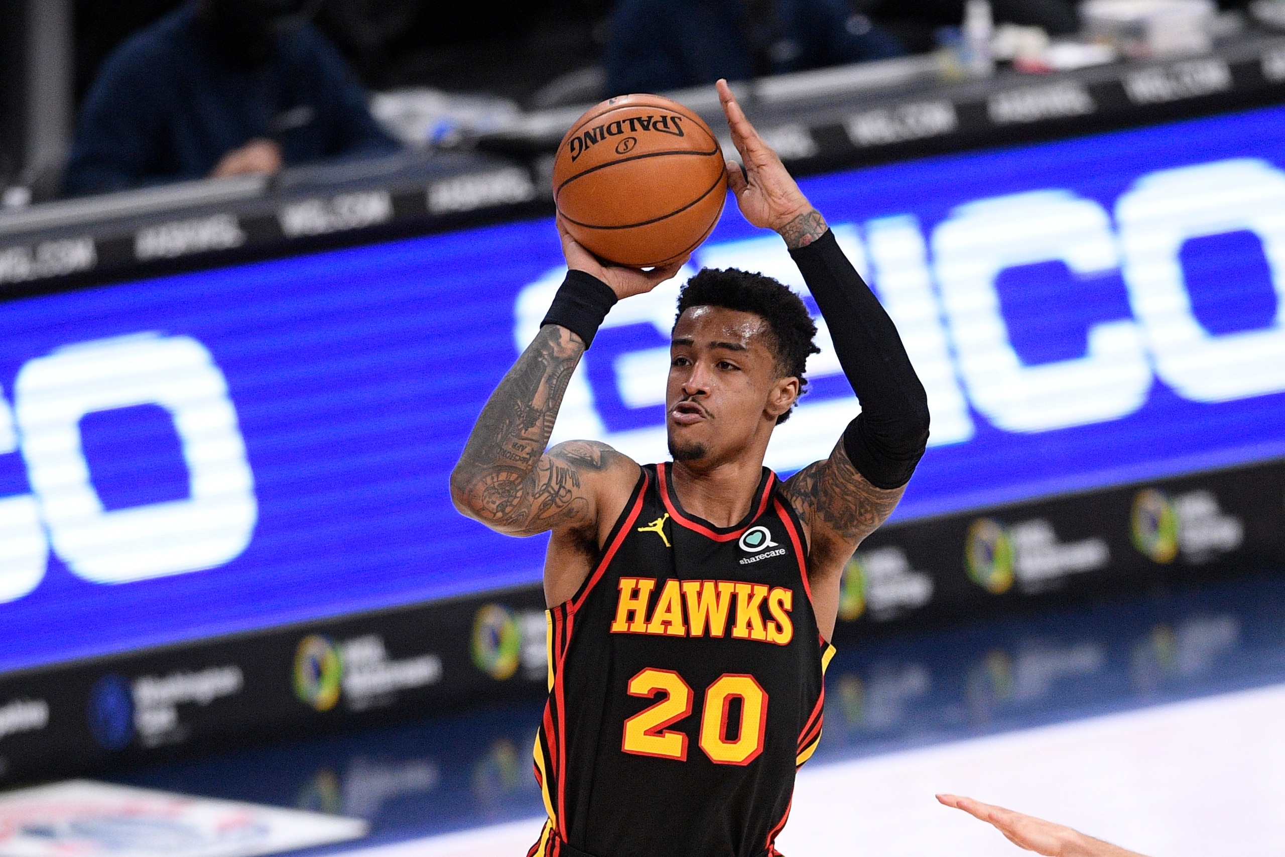 Atlanta Hawks forward John Collins (20) shoots during the first half of an NBA basketball game against the Washington Wizards, Friday, Jan. 29, 2021, in Washington. (AP Photo/Nick Wass)