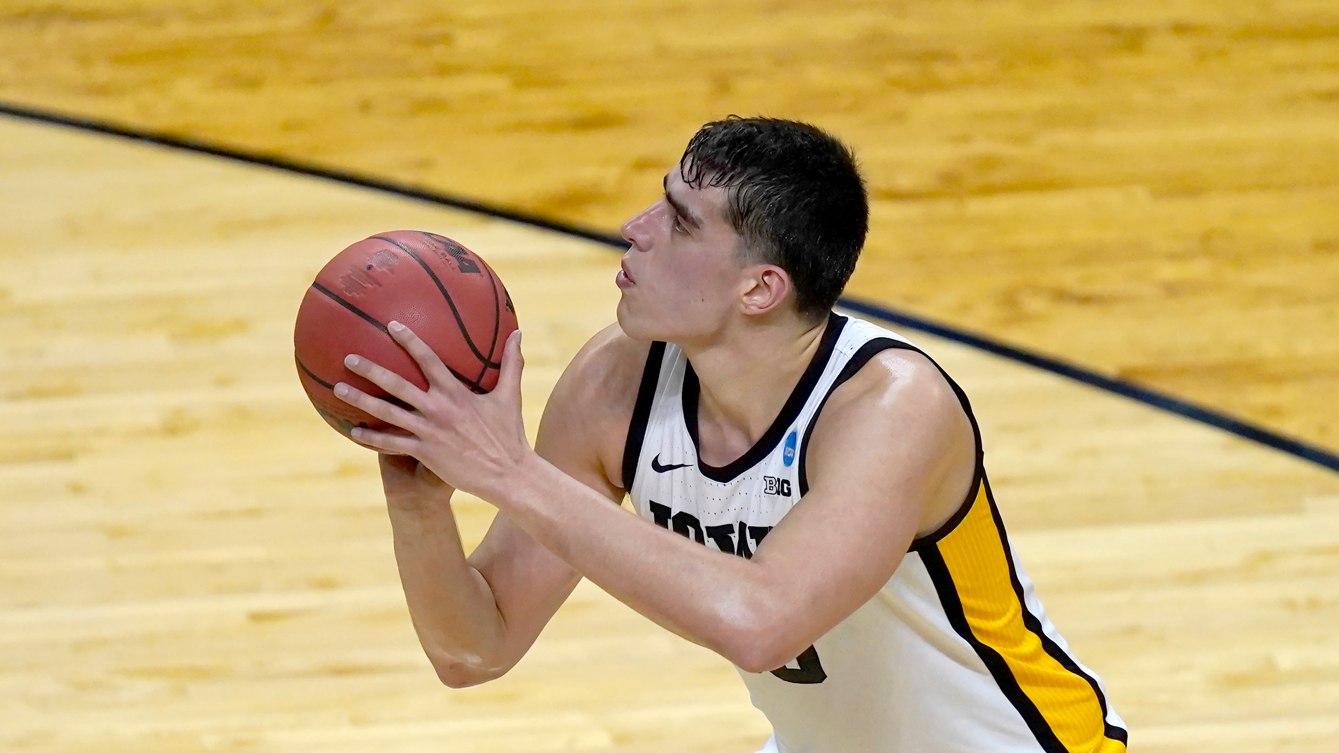 Iowa's Luka Garza shoots a free throw during the second half of a first round NCAA college basketball tournament game against Grand Canyon Saturday, March 20, 2021, at the Indiana Farmers Coliseum in Indianapolis. Iowa won 86-74. (AP Photo/Charles Rex Arbogast)