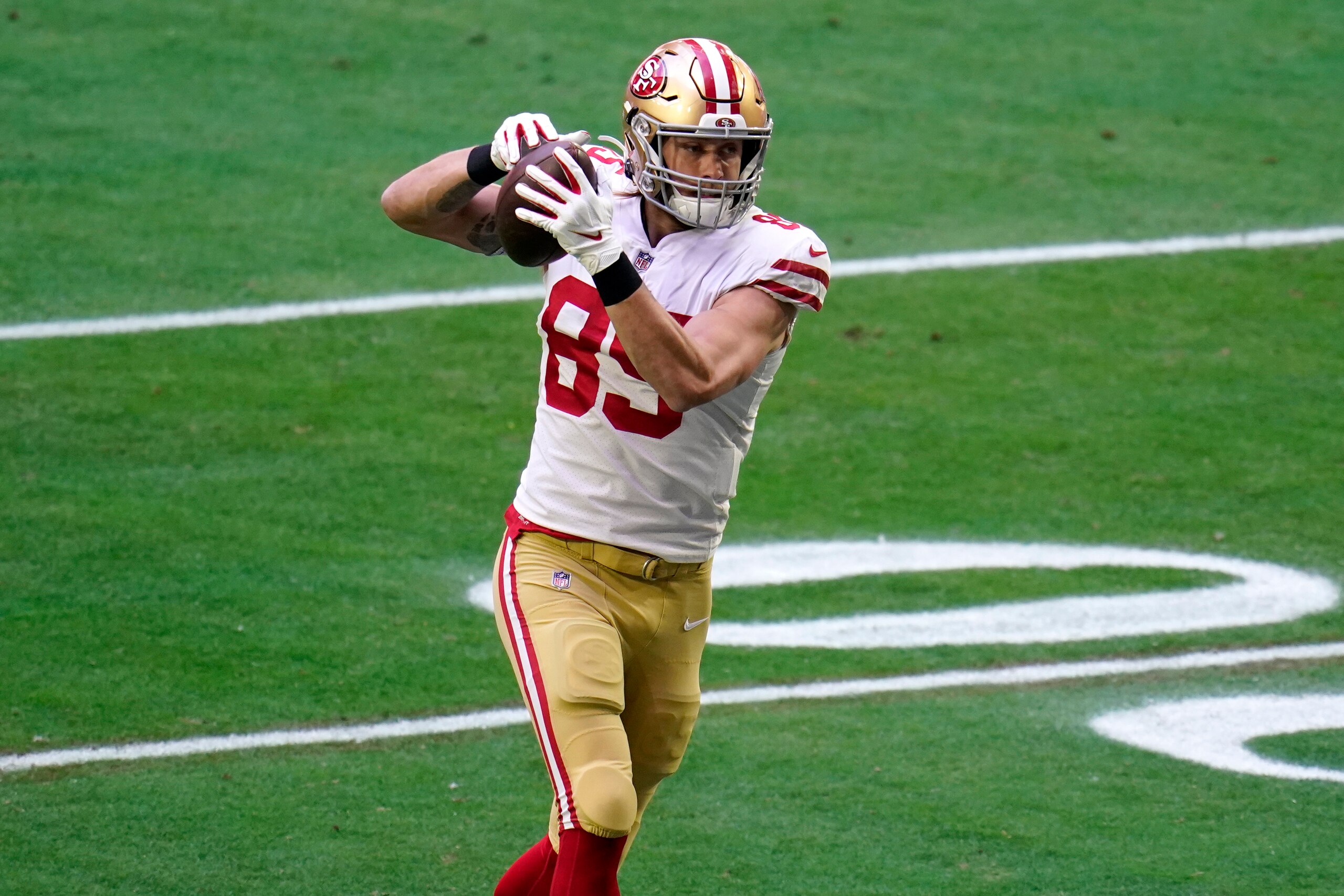 San Francisco 49ers tight end George Kittle (85) warms up prior to an NFL football game against the Seattle Seahawks, Sunday, Jan. 3, 2021, in Glendale, Ariz. (AP Photo/Ross D. Franklin)