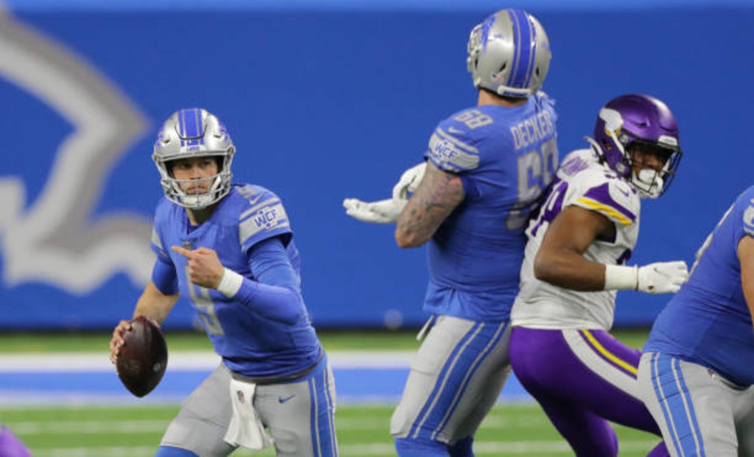 DETROIT, MICHIGAN - JANUARY 03: Matthew Stafford #9 of the Detroit Lions runs for a first down during the second quarter of the game against the Minnesota Vikings at Ford Field on January 03, 2021 in Detroit, Michigan. (Photo by Leon Halip/Getty Images) DETROIT, MICHIGAN - JANUARY 03: Matthew Stafford #9 of the Detroit Lions runs for a first down during the second quarter of the game against the Minnesota Vikings at Ford Field on January 03, 2021 in Detroit, Michigan. (Photo by Leon Halip/Getty Images)