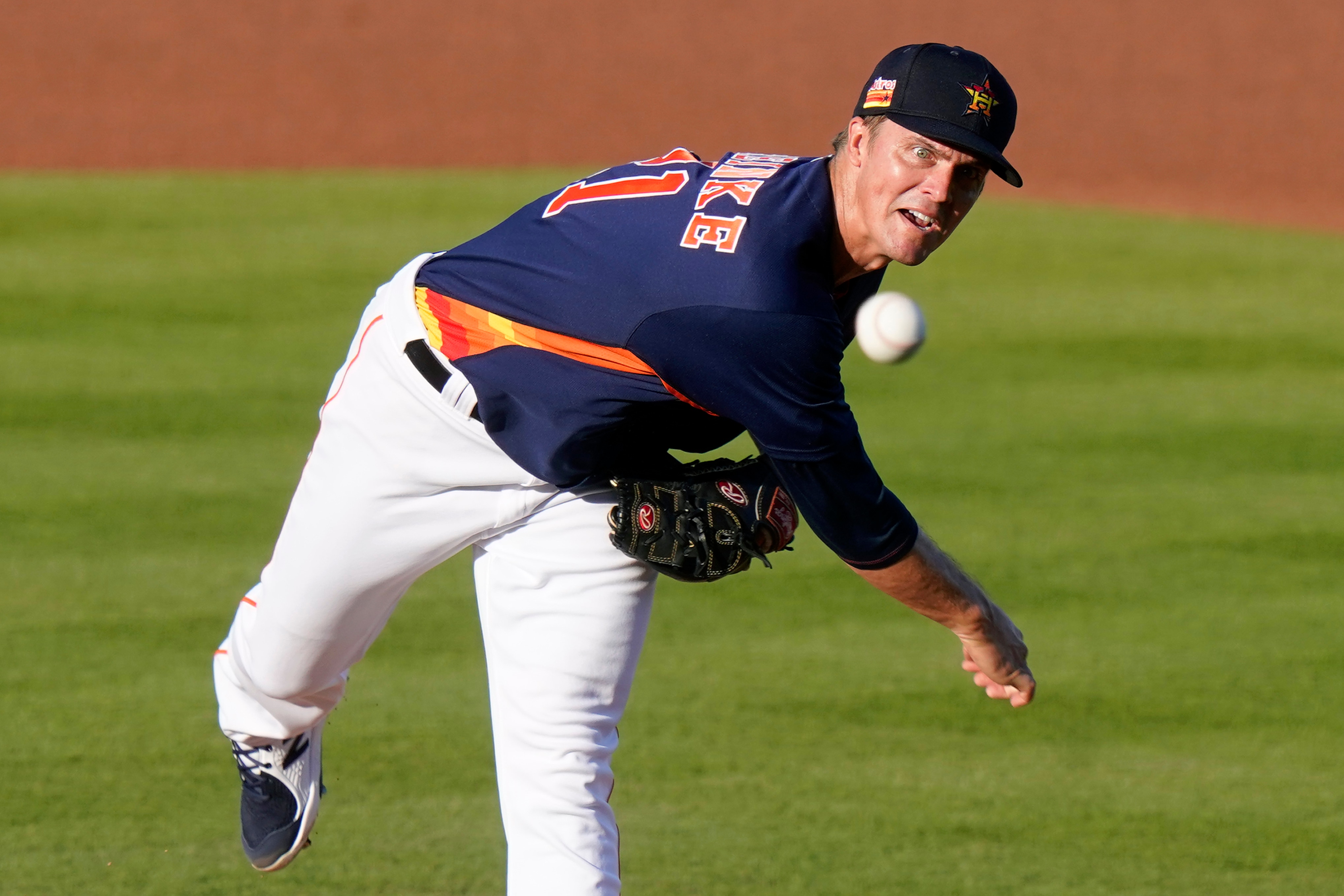 Houston Astros starting pitcher Zack Greinke throws during the first inning of the team's spring training baseball game against the Miami Marlins, Friday, March 26, 2021, in West Palm Beach, Fla. (AP Photo/Lynne Sladky)