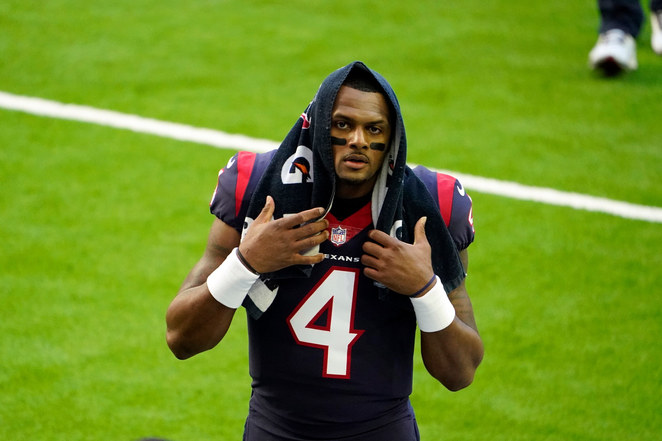 Houston Texans quarterback Deshaun Watson walks off the field before an NFL football game against the Tennessee Titans Sunday, Jan. 3, 2021, in Houston. (AP Photo/Eric Christian Smith)
