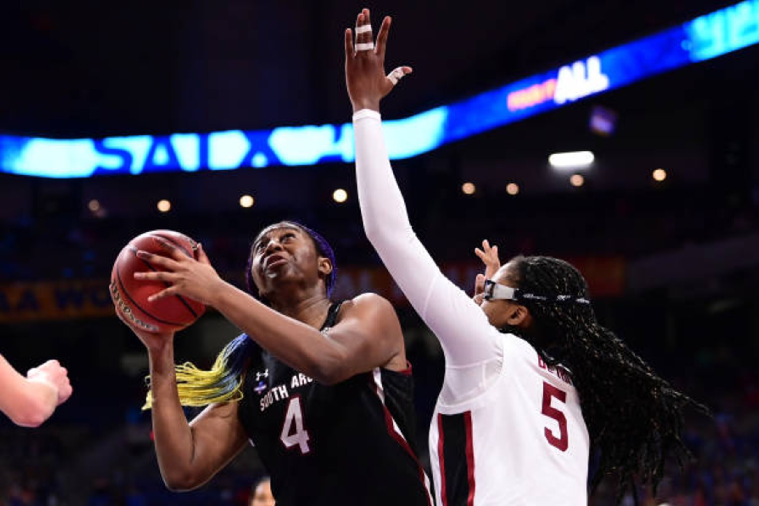 SAN ANTONIO, TX - APRIL 2: Aliyah Boston #4 of the South Carolina Gamecocks shoots over Francesca Belibi #5 of the Stanford Cardinal during the semifinals of the NCAA Women's Basketball Tournament at Alamodome on April 2, 2021 in San Antonio, Texas. (Photo by Ben Solomon via Getty Images)