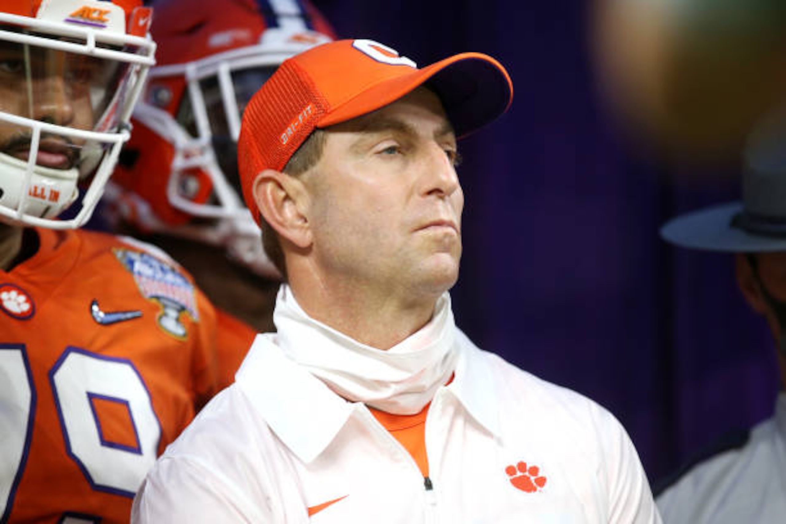 NEW ORLEANS, LOUISIANA - JANUARY 01: Head coach Dabo Swinney of the Clemson Tigers looks on before the game against the Ohio State Buckeyes during the College Football Playoff semifinal game at the Allstate Sugar Bowl at Mercedes-Benz Superdome on January 01, 2021 in New Orleans, Louisiana. (Photo by Chris Graythen/Getty Images) NEW ORLEANS, LOUISIANA - JANUARY 01: Head coach Dabo Swinney of the Clemson Tigers looks on before the game against the Ohio State Buckeyes during the College Football Playoff semifinal game at the Allstate Sugar Bowl at Mercedes-Benz Superdome on January 01, 2021 in New Orleans, Louisiana. (Photo by Chris Graythen/Getty Images)
