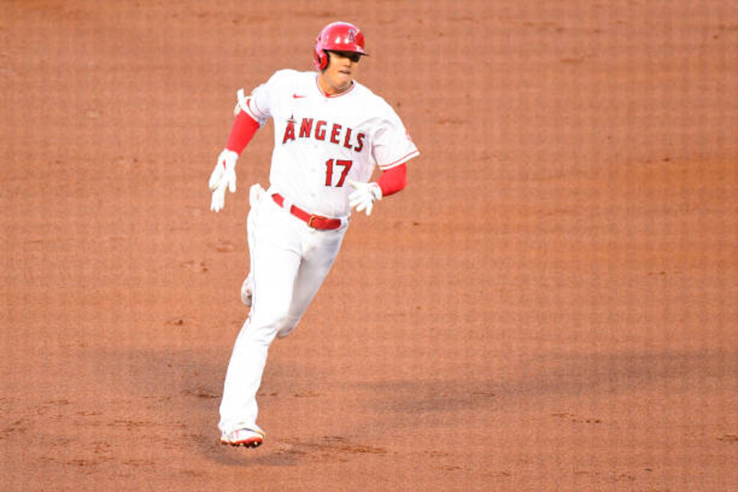ANAHEIM, CA - APRIL 02: Los Angeles Angels designated hitter Shohei Ohtani (17) heads towards third base on his triple during a MLB game between the Chicago White Sox and the Los Angeles Angels of Anaheim on April 2, 2021 at Angel Stadium of Anaheim in Anaheim, CA. (Photo by Brian Rothmuller/Icon Sportswire via Getty Images)