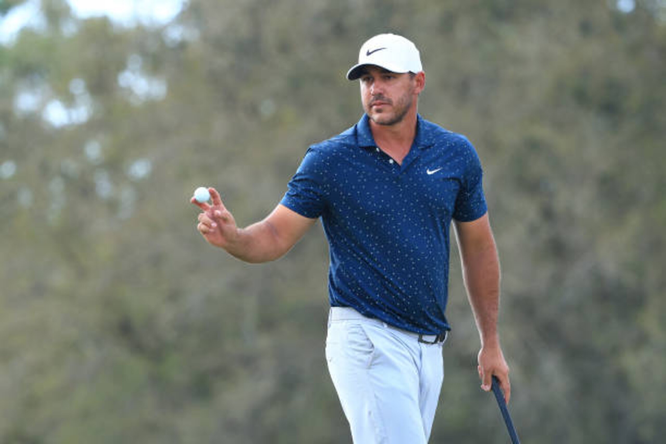 BRADENTON, FLORIDA - FEBRUARY 28: Brooks Koepka of the United States waves on the seventh green during the final round of World Golf Championships-Workday Championship at The Concession on February 28, 2021 in Bradenton, Florida. (Photo by Mike Ehrmann/Getty Images)