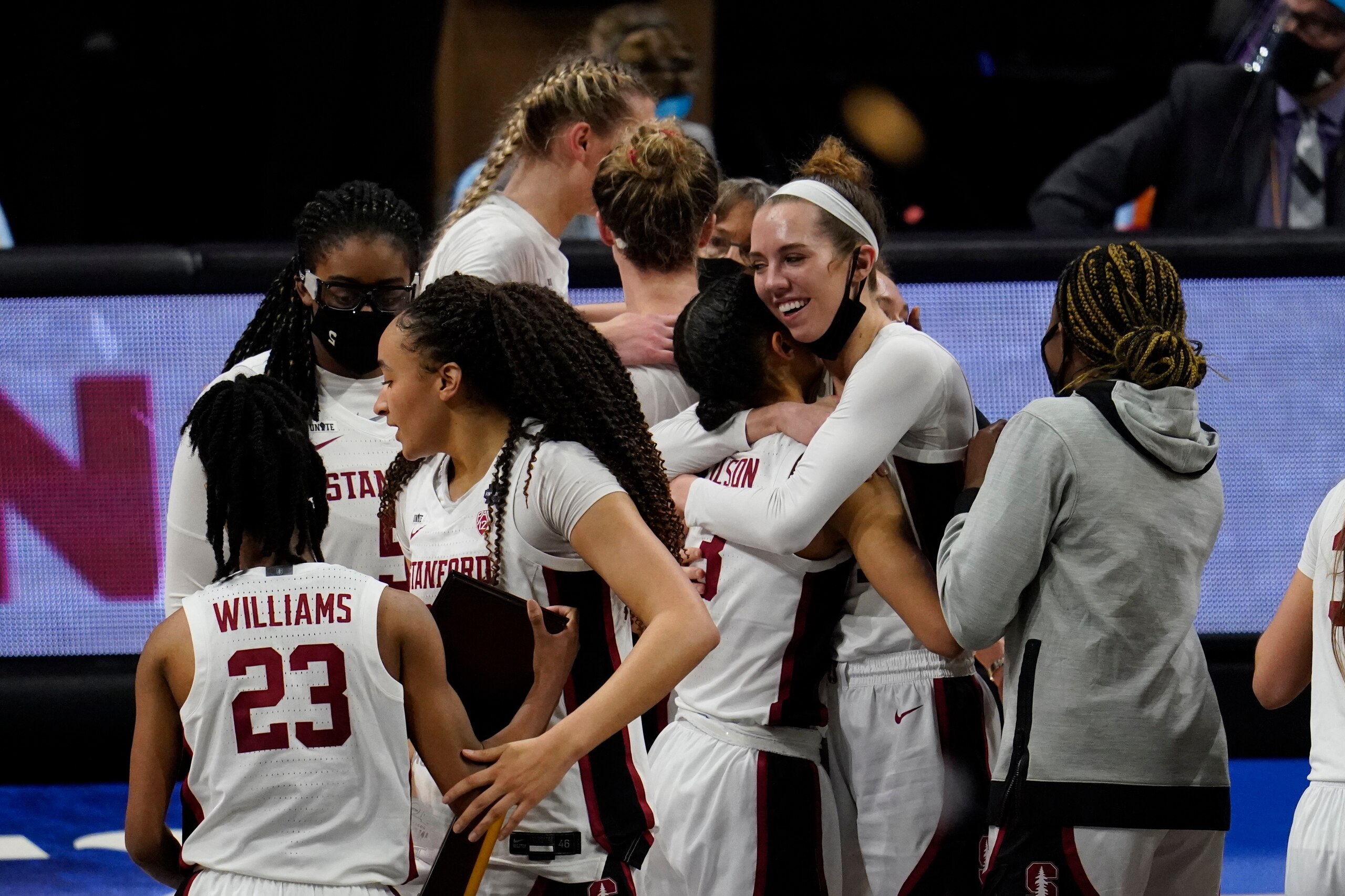 Stanford players celebrate at the end of the championship game against Arizona in the women's Final Four NCAA college basketball tournament, Sunday, April 4, 2021, at the Alamodome in San Antonio. Stanford won 54-53. (AP Photo/Eric Gay)