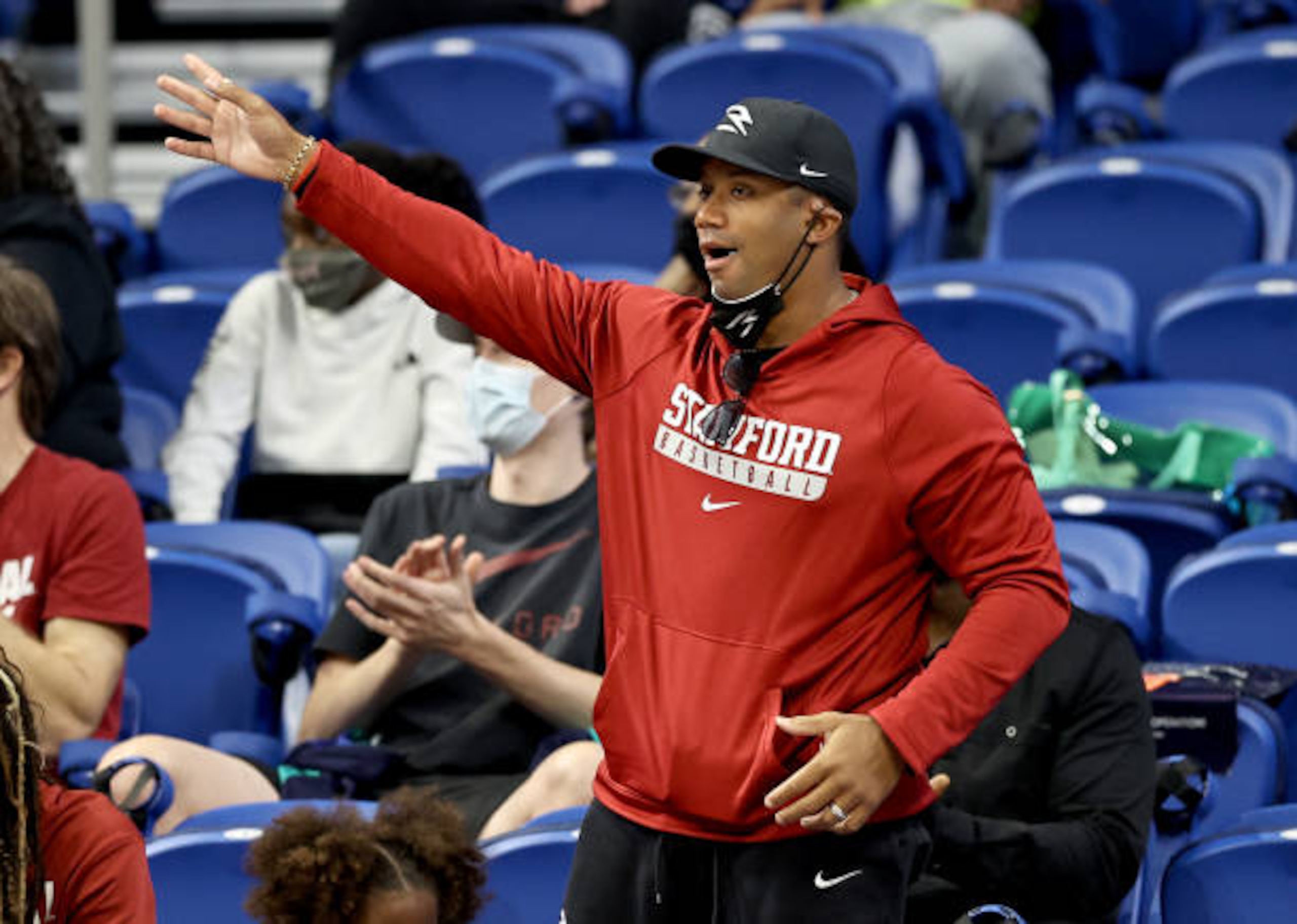 SAN ANTONIO, TEXAS - MARCH 28: Seattle Seahawks quarterback Russell Wilson cheers on his sister Anna Wilson #3 of the Stanford Cardinal in the first half against the Missouri State Lady Bears during the Sweet Sixteen round of the NCAA Women's Basketball Tournament at the Alamodome on March 28, 2021 in San Antonio, Texas.The Stanford Cardinal defeated the Missouri State Lady Bears 89-62. (Photo by Elsa/Getty Images) SAN ANTONIO, TEXAS - MARCH 28: Seattle Seahawks quarterback Russell Wilson cheers on his sister Anna Wilson #3 of the Stanford Cardinal in the first half against the Missouri State Lady Bears during the Sweet Sixteen round of the NCAA Women's Basketball Tournament at the Alamodome on March 28, 2021 in San Antonio, Texas.The Stanford Cardinal defeated the Missouri State Lady Bears 89-62. (Photo by Elsa/Getty Images)