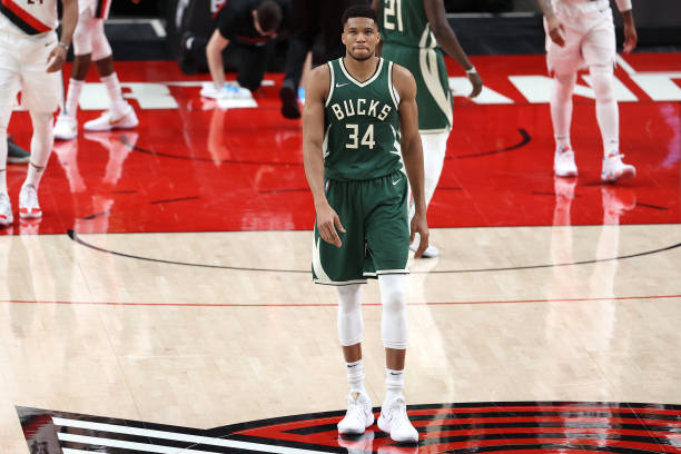 PORTLAND, OREGON - APRIL 02: Giannis Antetokounmpo #34 of the Milwaukee Bucks reacts in the second quarter against the Portland Trail Blazers at Moda Center on April 02, 2021 in Portland, Oregon. NOTE TO USER: User expressly acknowledges and agrees that, by downloading and or using this photograph, User is consenting to the terms and conditions of the Getty Images License Agreement.  (Photo by Abbie Parr/Getty Images)