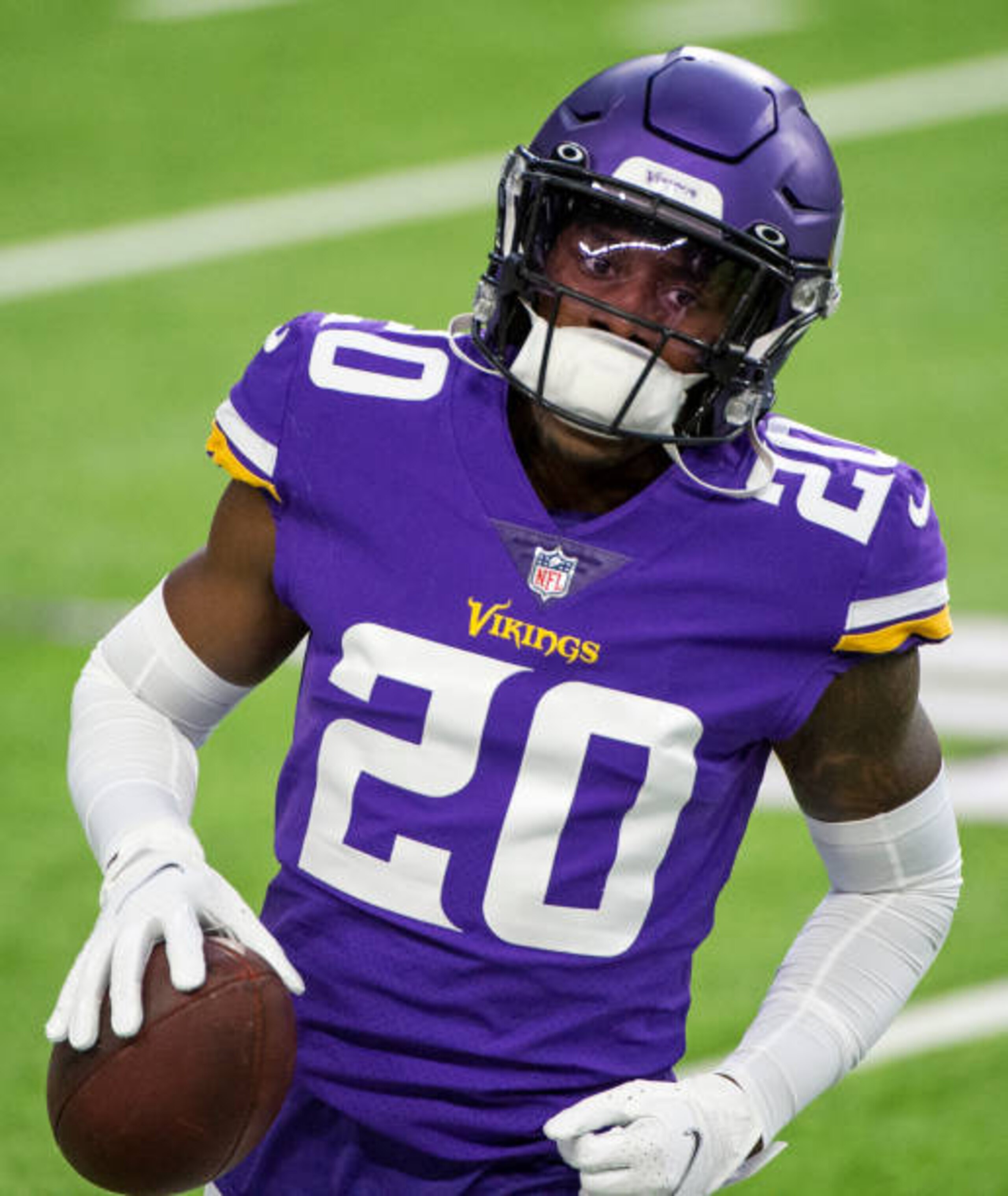 MINNEAPOLIS, MN - NOVEMBER 29: Jeff Gladney #20 of the Minnesota Vikings warms up before the game against the Carolina Panthers at U.S. Bank Stadium on November 29, 2020 in Minneapolis, Minnesota. (Photo by Stephen Maturen/Getty Images)