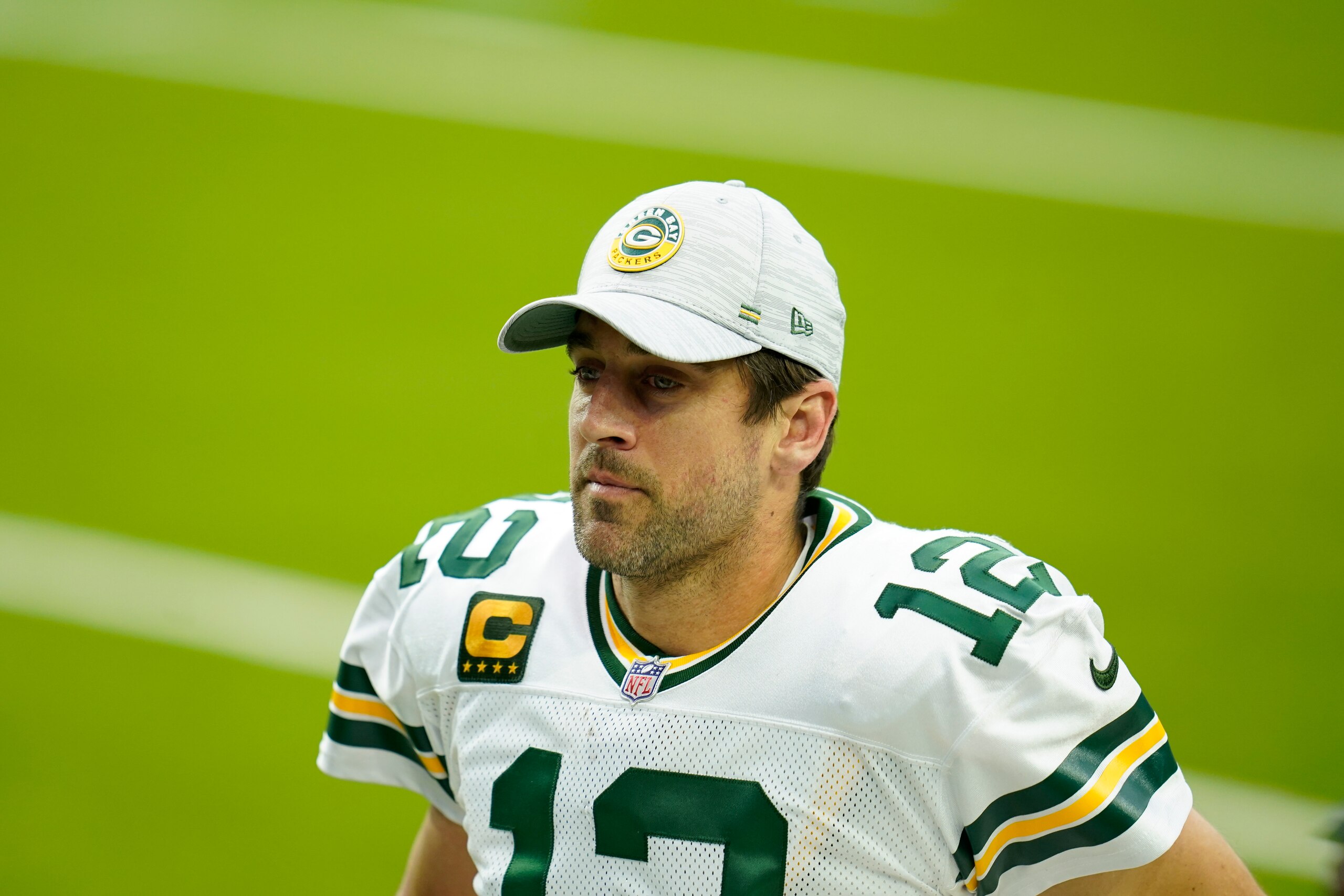Green Bay Packers quarterback Aaron Rodgers (12) walks to the locker room at halftime during an NFL football game against the Houston Texans, Sunday, Oct. 11, 2020, in Houston. (AP Photo/Matt Patterson)
