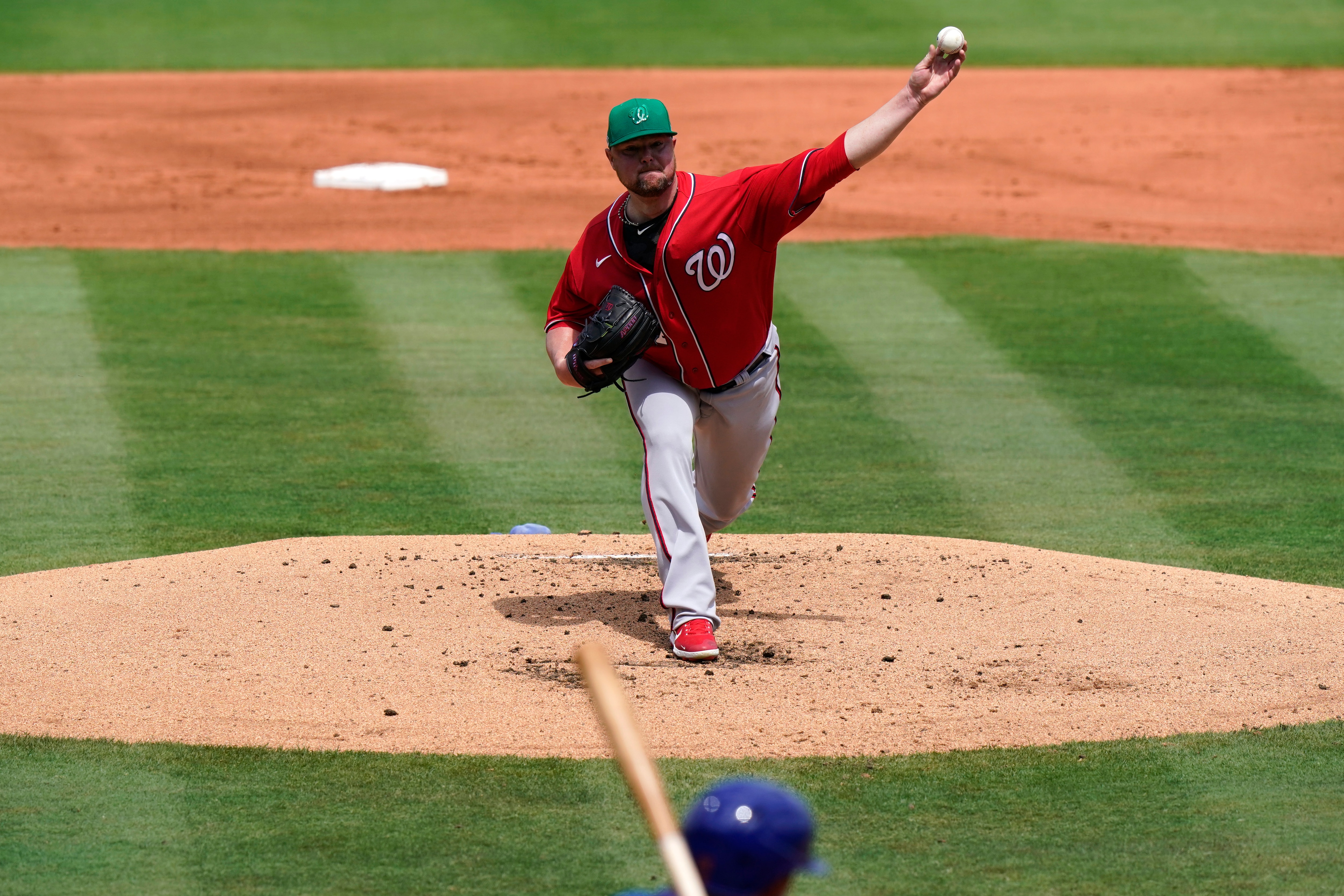 Washington Nationals starting pitcher Jon Lester throws during the first inning of a spring training baseball game against the New York Mets, Thursday, March 18, 2021, in Port St. Lucie, Fla. (AP Photo/Lynne Sladky)