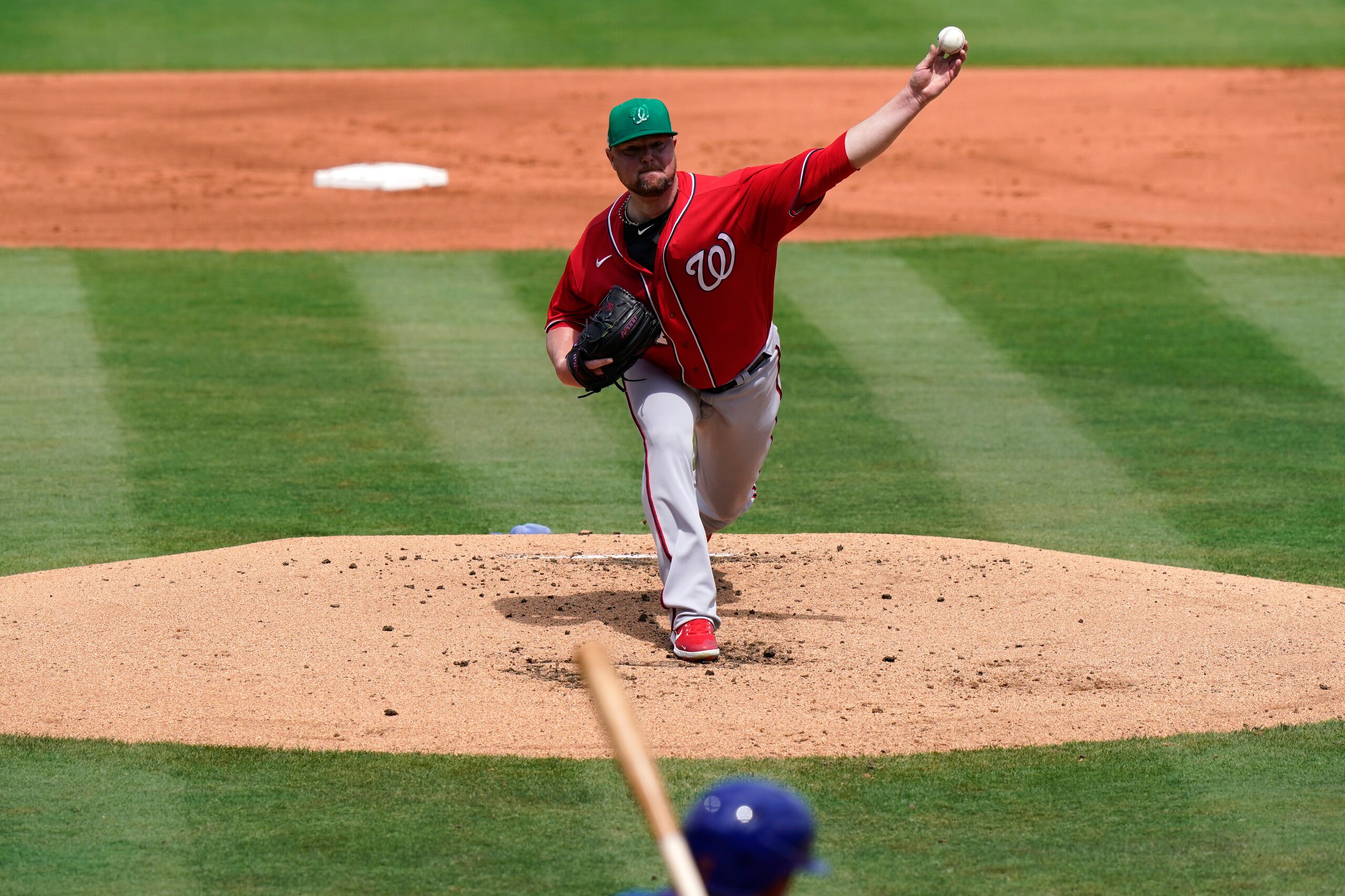 Washington Nationals starting pitcher Jon Lester throws during the first inning of a spring training baseball game against the New York Mets, Thursday, March 18, 2021, in Port St. Lucie, Fla. (AP Photo/Lynne Sladky)