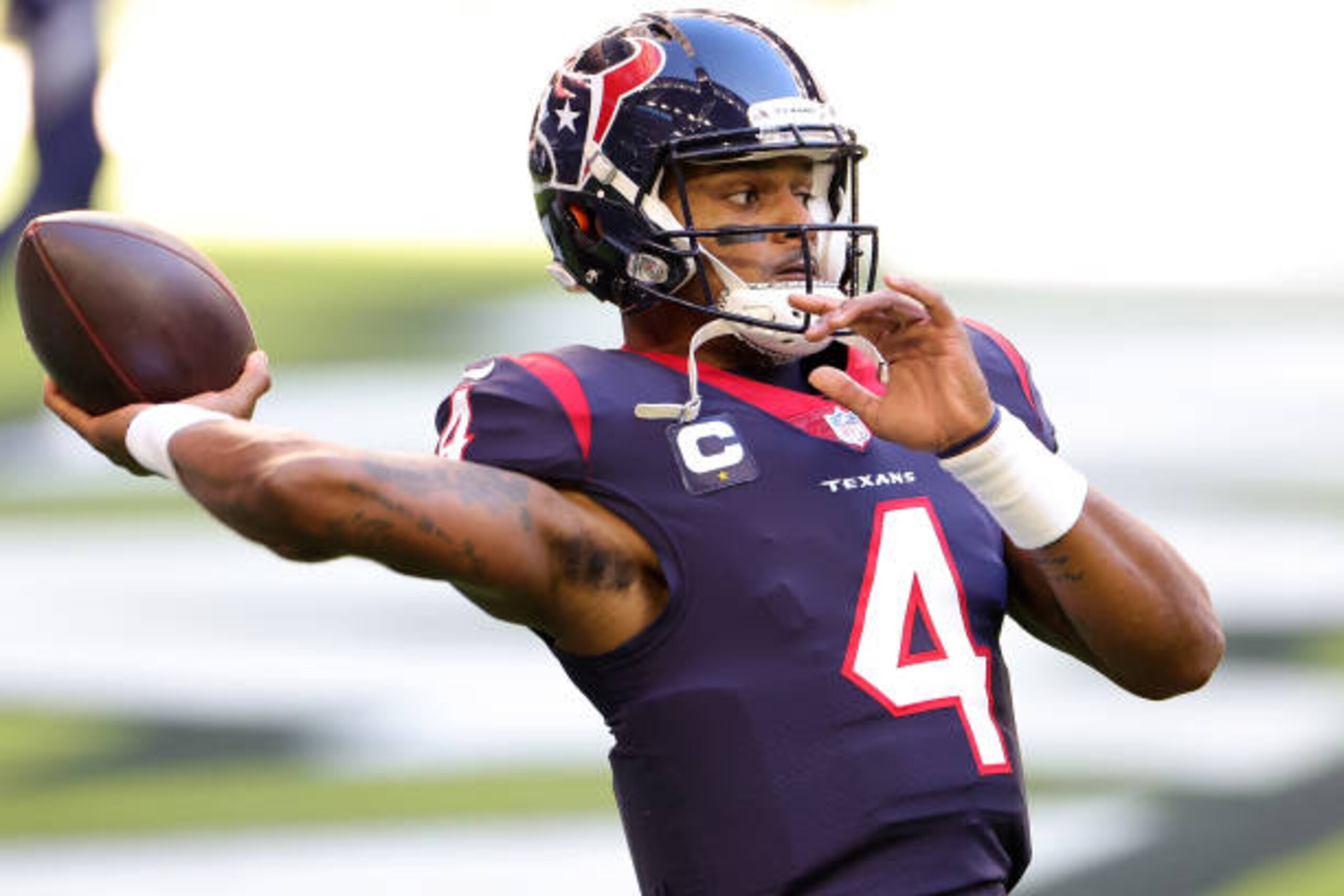 HOUSTON, TEXAS - JANUARY 03: Deshaun Watson #4 of the Houston Texans participates in warmups prior to a game against the Tennessee Titans at NRG Stadium on January 03, 2021 in Houston, Texas. (Photo by Carmen Mandato/Getty Images) HOUSTON, TEXAS - JANUARY 03: Deshaun Watson #4 of the Houston Texans participates in warmups prior to a game against the Tennessee Titans at NRG Stadium on January 03, 2021 in Houston, Texas. (Photo by Carmen Mandato/Getty Images)