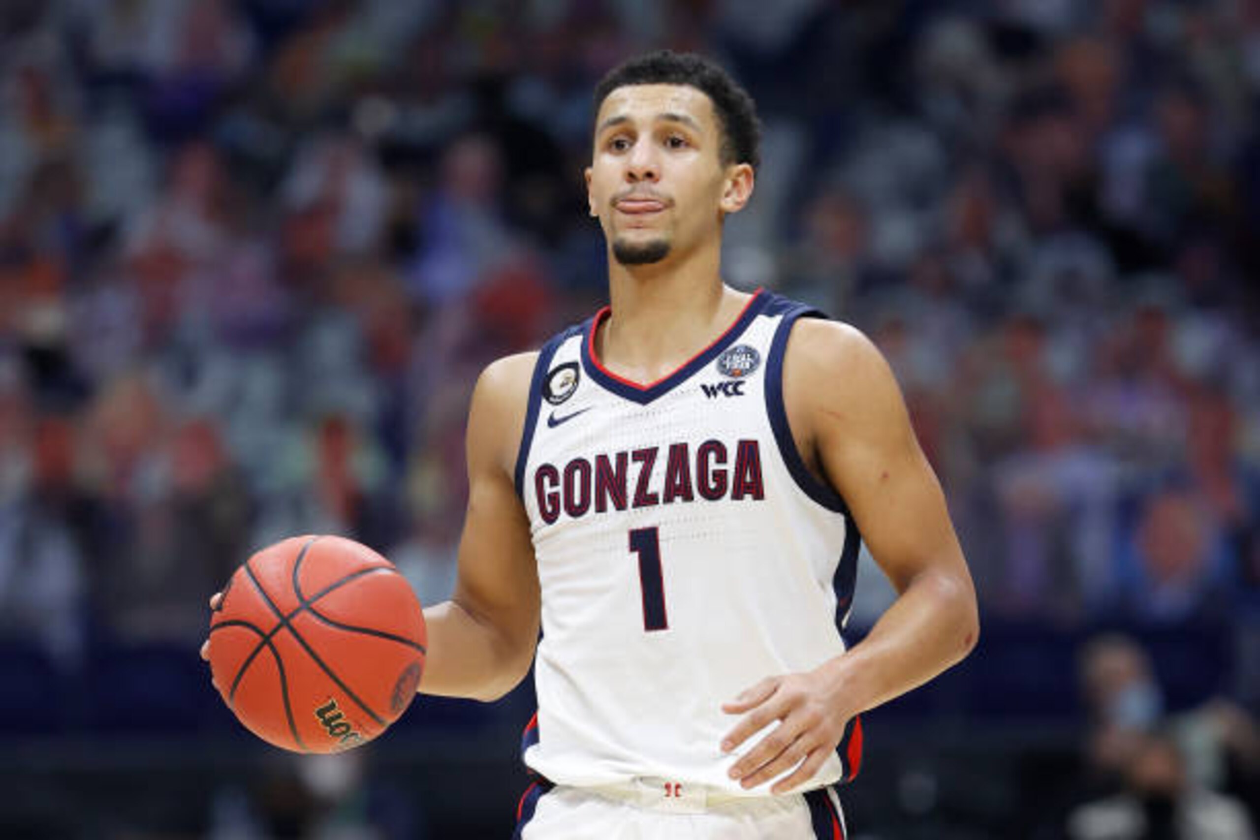 INDIANAPOLIS, INDIANA - APRIL 05: Jalen Suggs #1 of the Gonzaga Bulldogs dribbles during the second half in the National Championship game of the 2021 NCAA Men's Basketball Tournament against the Baylor Bears at Lucas Oil Stadium on April 05, 2021 in Indianapolis, Indiana. (Photo by Jamie Squire/Getty Images)
