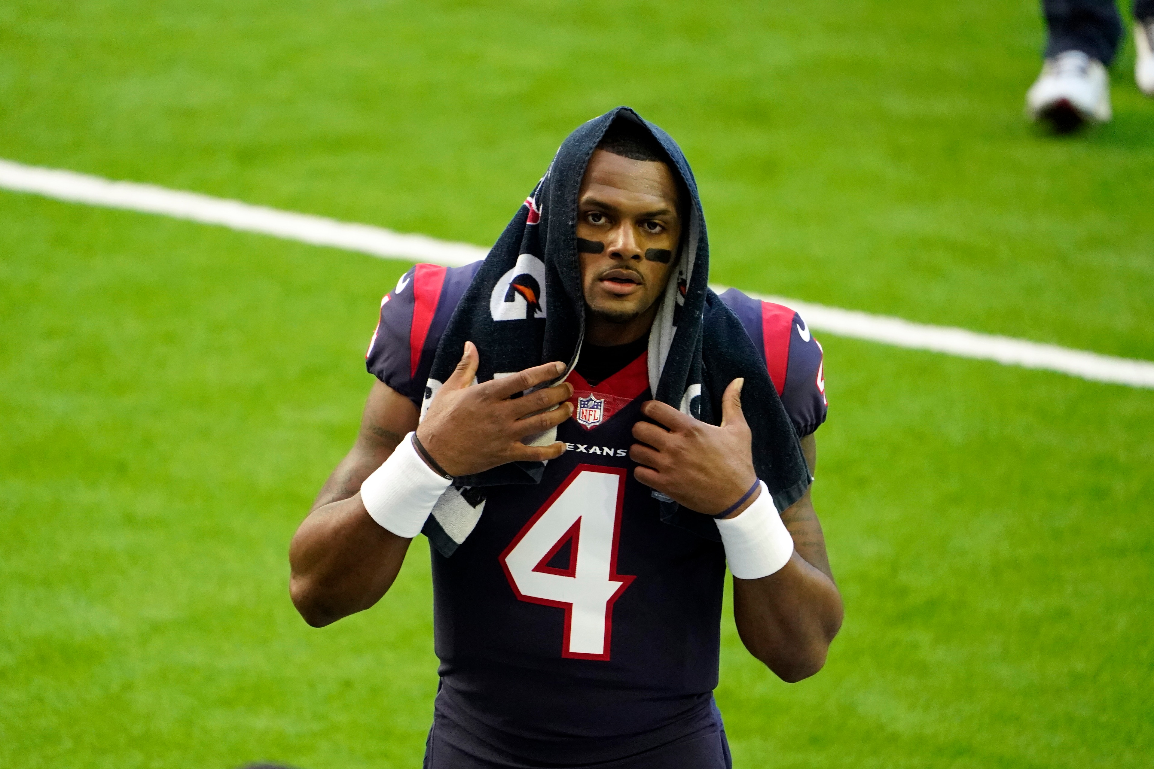 Houston Texans quarterback Deshaun Watson walks off the field before an NFL football game against the Tennessee Titans Sunday, Jan. 3, 2021, in Houston. (AP Photo/Eric Christian Smith)