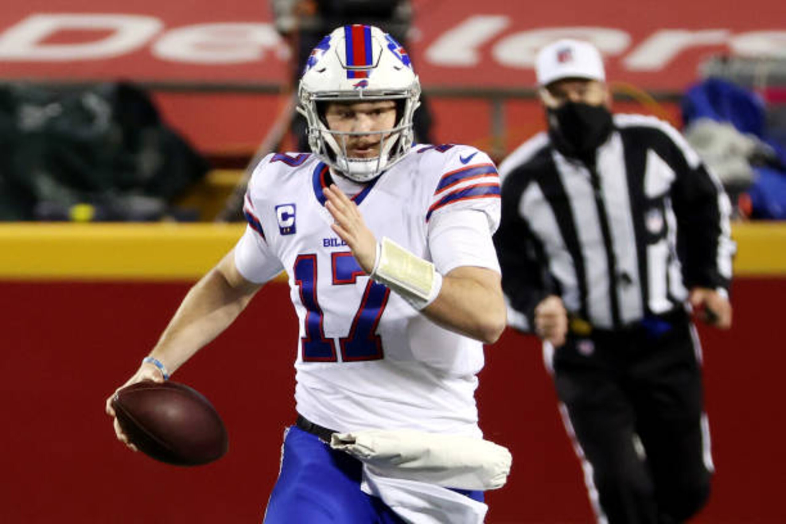 KANSAS CITY, MISSOURI - JANUARY 24: Josh Allen #17 of the Buffalo Bills runs with the ball in the first quarter against the Kansas City Chiefs during the AFC Championship game at Arrowhead Stadium on January 24, 2021 in Kansas City, Missouri. (Photo by Jamie Squire/Getty Images)