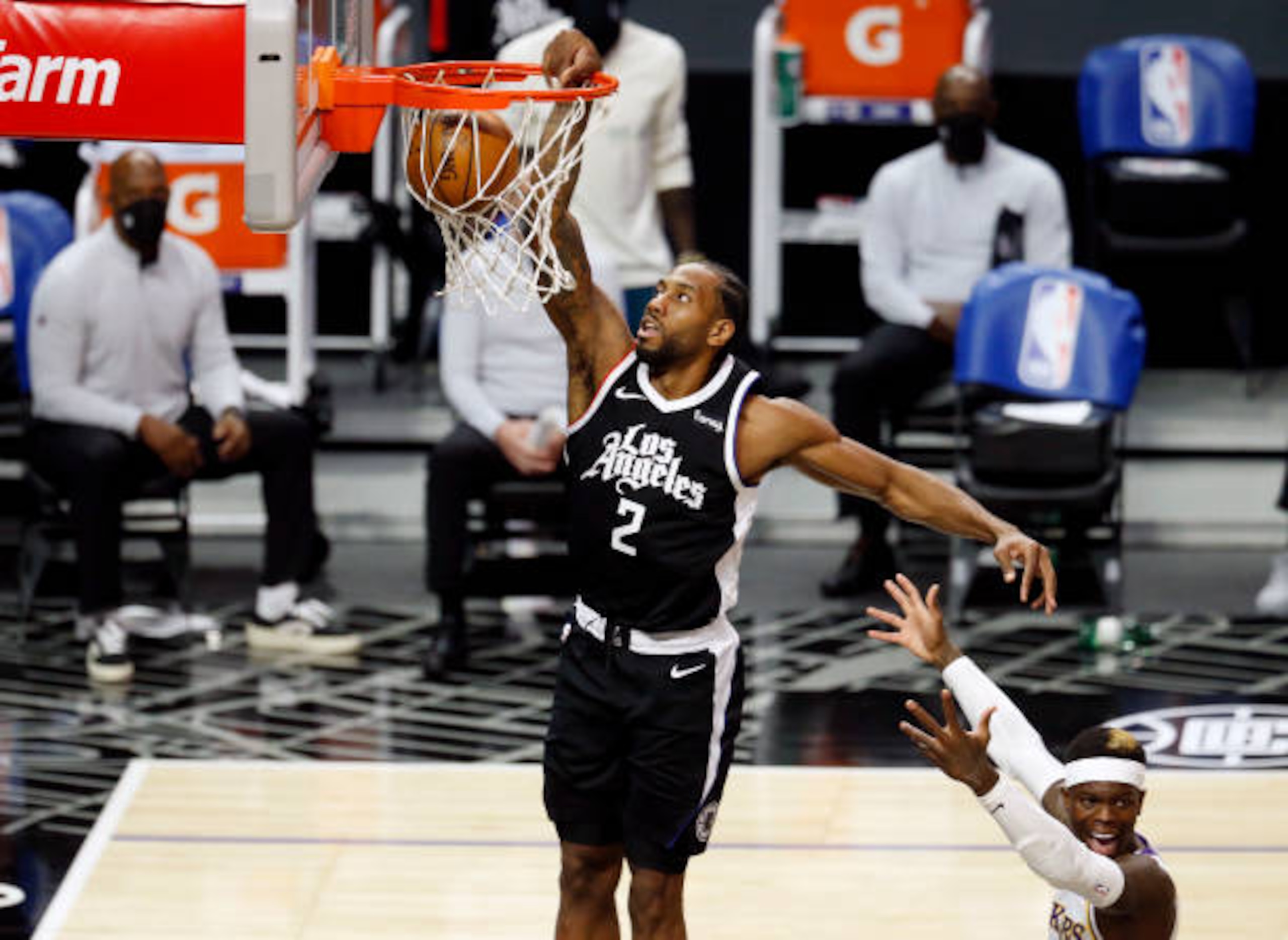 LOS ANGELES, CA - APRIL 04: LA Clippers forward Kawhi Leonard (2) slam dunks the ball against the Los Angeles Lakers in the first quarter at the Staples Center on Sunday, April 4, 2021 in Los Angeles, CA. (Photo by Gary Coronado / Los Angeles Times via Getty Images) LOS ANGELES, CA - APRIL 04: LA Clippers forward Kawhi Leonard (2) slam dunks the ball against the Los Angeles Lakers in the first quarter at the Staples Center on Sunday, April 4, 2021 in Los Angeles, CA. (Photo by Gary Coronado / Los Angeles Times via Getty Images)