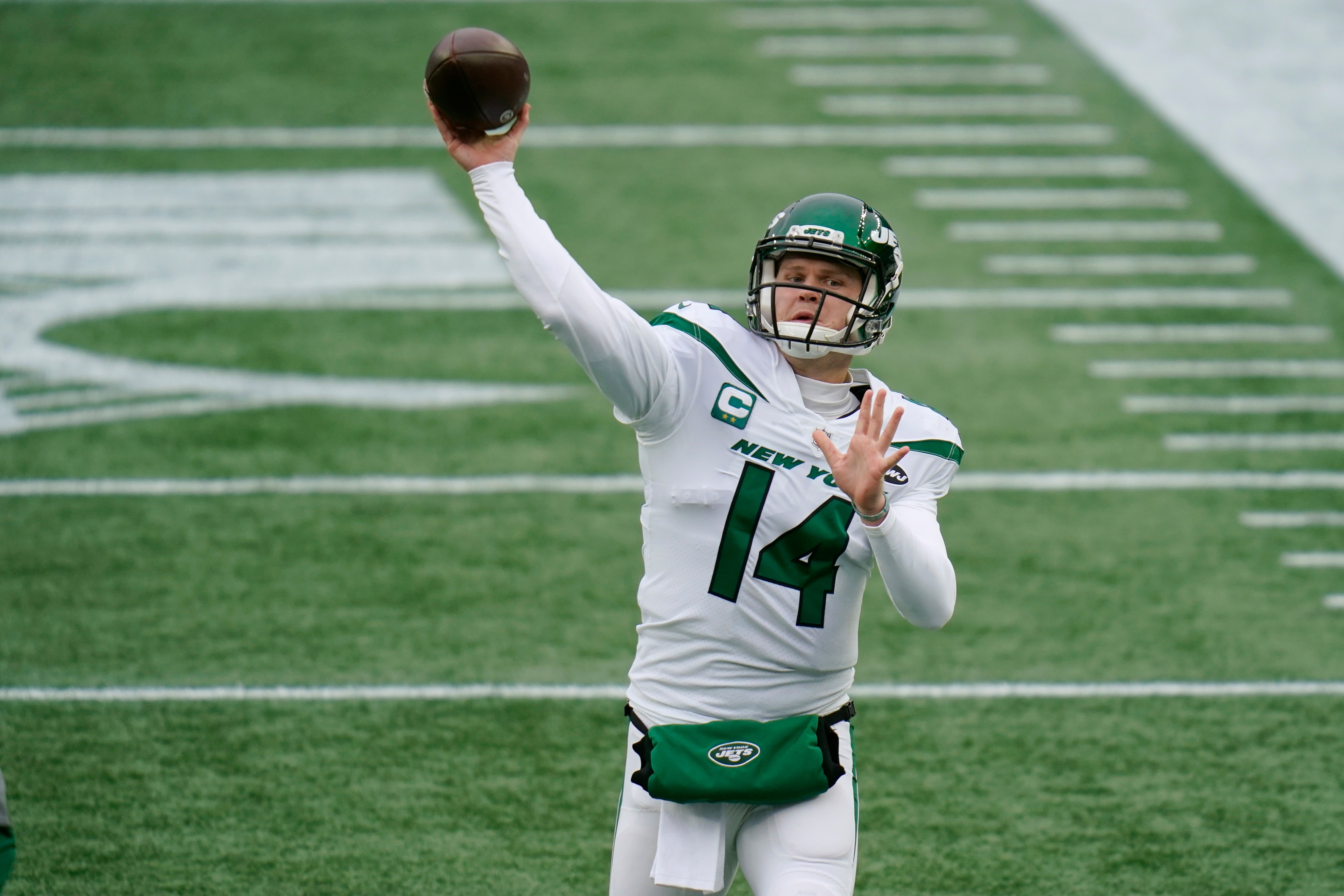 New York Jets quarterback Sam Darnold warms up before an NFL football game against the New England Patriots, Sunday, Jan. 3, 2021, in Foxborough, Mass. (AP Photo/Charles Krupa)