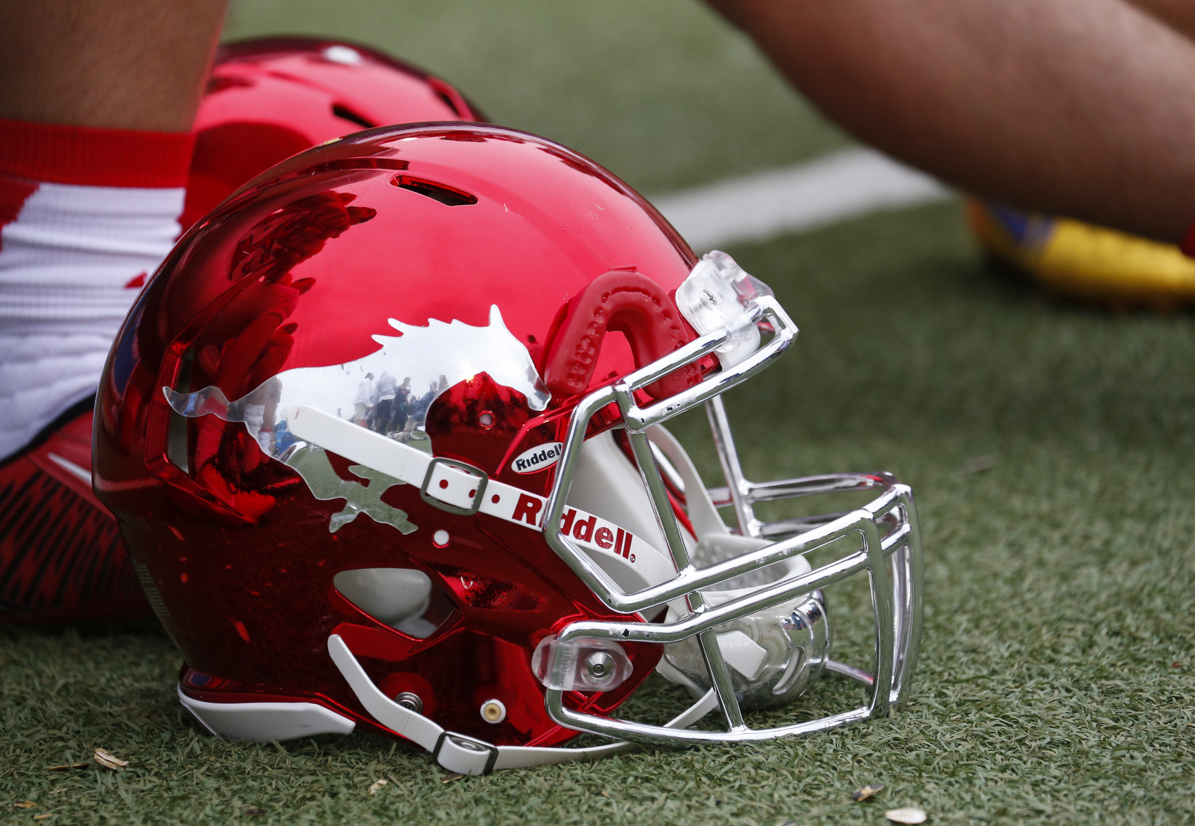 An SMU football helmet sits on the sideline before an NCAA football game against Tulsa, Saturday, Oct. 31, 2015, in Dallas. (AP Photo/Jim Cowsert)
