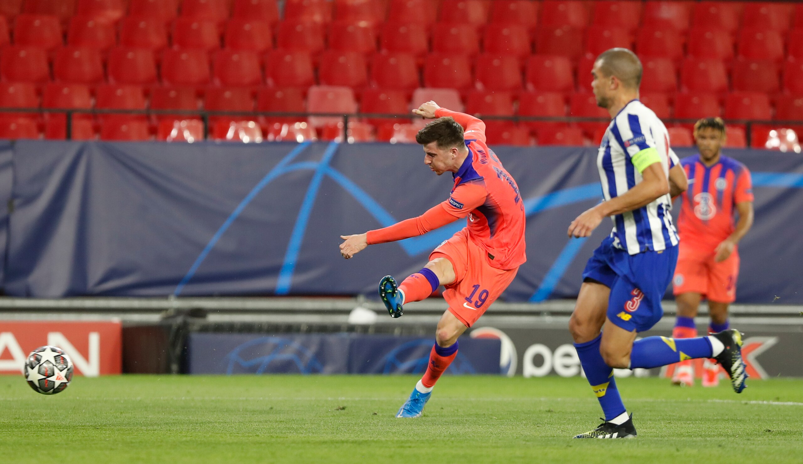 Chelsea's Mason Mount scores his side's opening goal during the Champions League, first leg, quarterfinal soccer match between FC Porto and Chelsea at the Ramon Sanchez-Pizjuan stadium in Seville, Spain, Wednesday, April 7, 2021. (AP Photo/Angel Fernandez) Chelsea's Mason Mount scores his side's opening goal during the Champions League, first leg, quarterfinal soccer match between FC Porto and Chelsea at the Ramon Sanchez-Pizjuan stadium in Seville, Spain, Wednesday, April 7, 2021. (AP Photo/Angel Fernandez)
