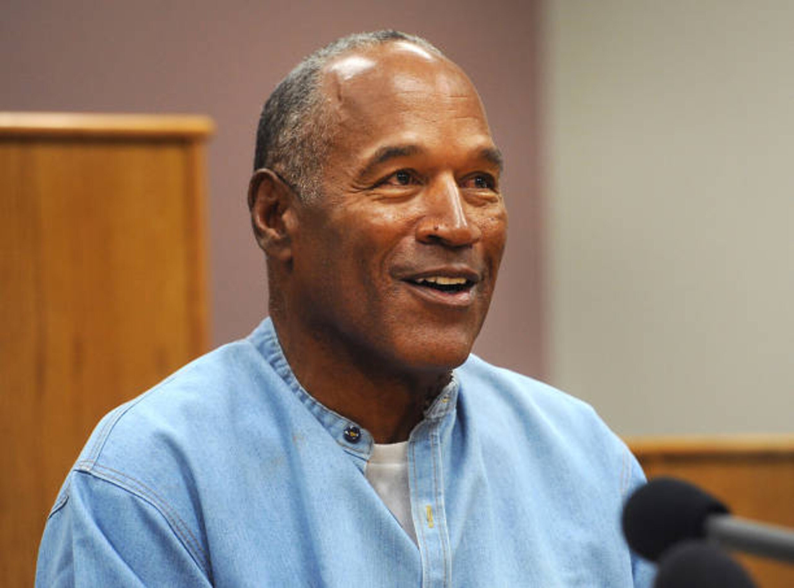 Former professional football player O.J. Simpson speaks during a parole hearing at Lovelock Correctional Center in Lovelock, Nevada, U.S., on Thursday, July 20, 2017. Simpson has been granted parole nine years into a 33-year sentence and could be released as soon as Oct. 1. Photographer: Jason Bean/Pool via Bloomberg Former professional football player O.J. Simpson speaks during a parole hearing at Lovelock Correctional Center in Lovelock, Nevada, U.S., on Thursday, July 20, 2017. Simpson has been granted parole nine years into a 33-year sentence and could be released as soon as Oct. 1. Photographer: Jason Bean/Pool via Bloomberg