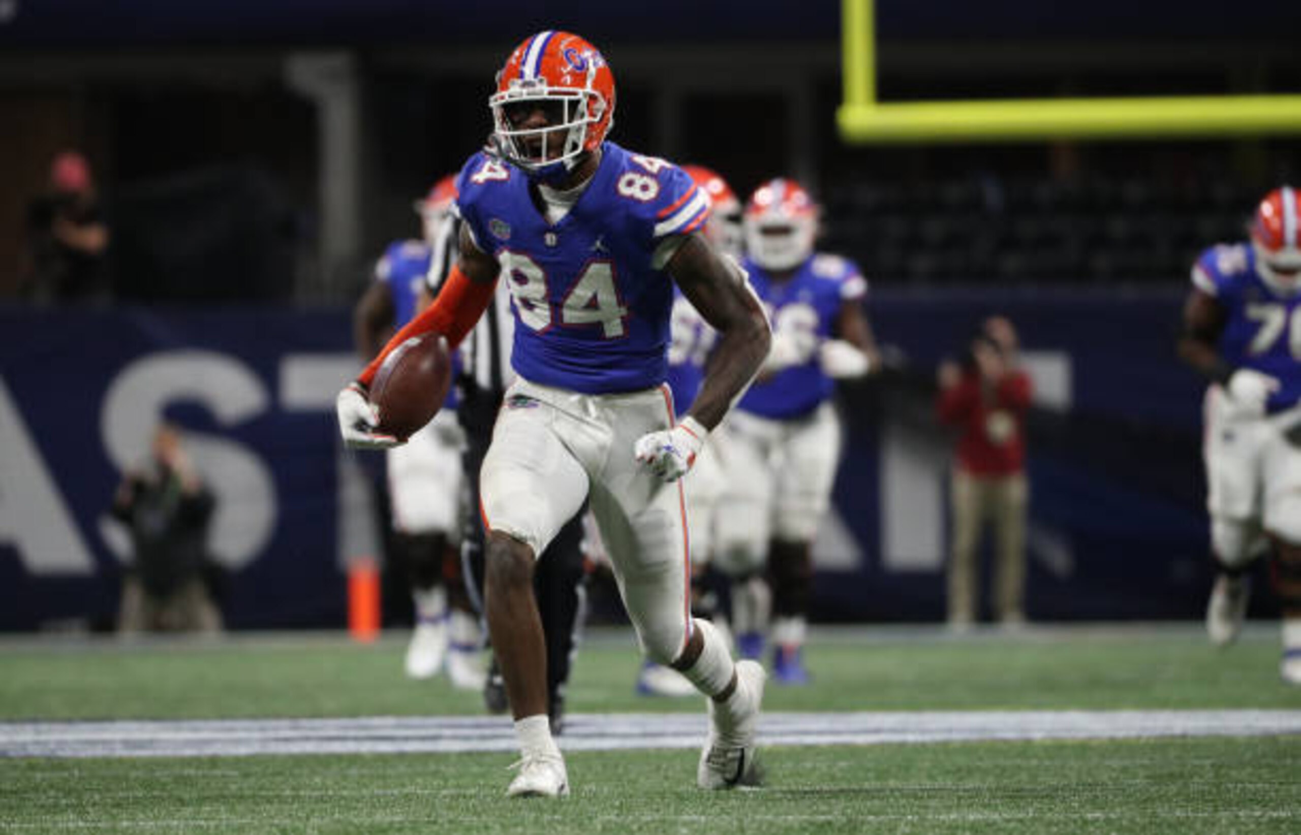 ATLANTA, GA - DECEMBER 19: Kyle Pitts #84 of the Florida Gators reacts after a gain against the Alabama Crimson Tide in the SEC Championship at Mercedes-Benz Stadium on December 19, 2020 in Atlanta, Georgia. (Photo by Courtney Culbreath/Collegiate Images/Getty Images)