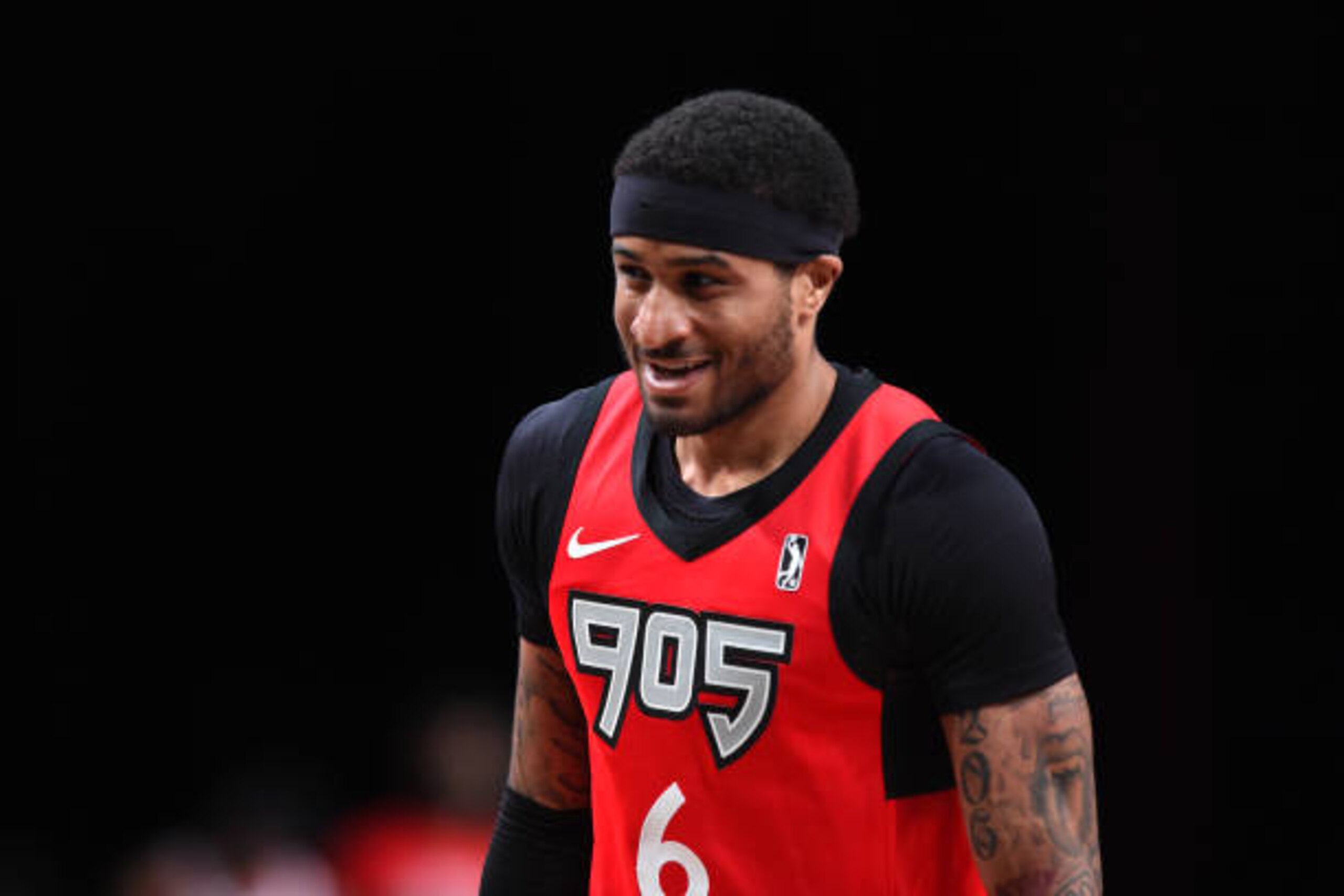 ORLANDO, FL - FEBRUARY 12: Gary Payton II #6 of the Raptors 905 smiles during the game on February 12, 2021 at AdventHealth Arena in Orlando, Florida. NOTE TO USER: User expressly acknowledges and agrees that, by downloading and/or using this Photograph, user is consenting to the terms and conditions of the Getty Images License Agreement. Mandatory Copyright Notice: Copyright 2021 NBAE (Photo by Juan Ocampo/NBAE via Getty Images)
