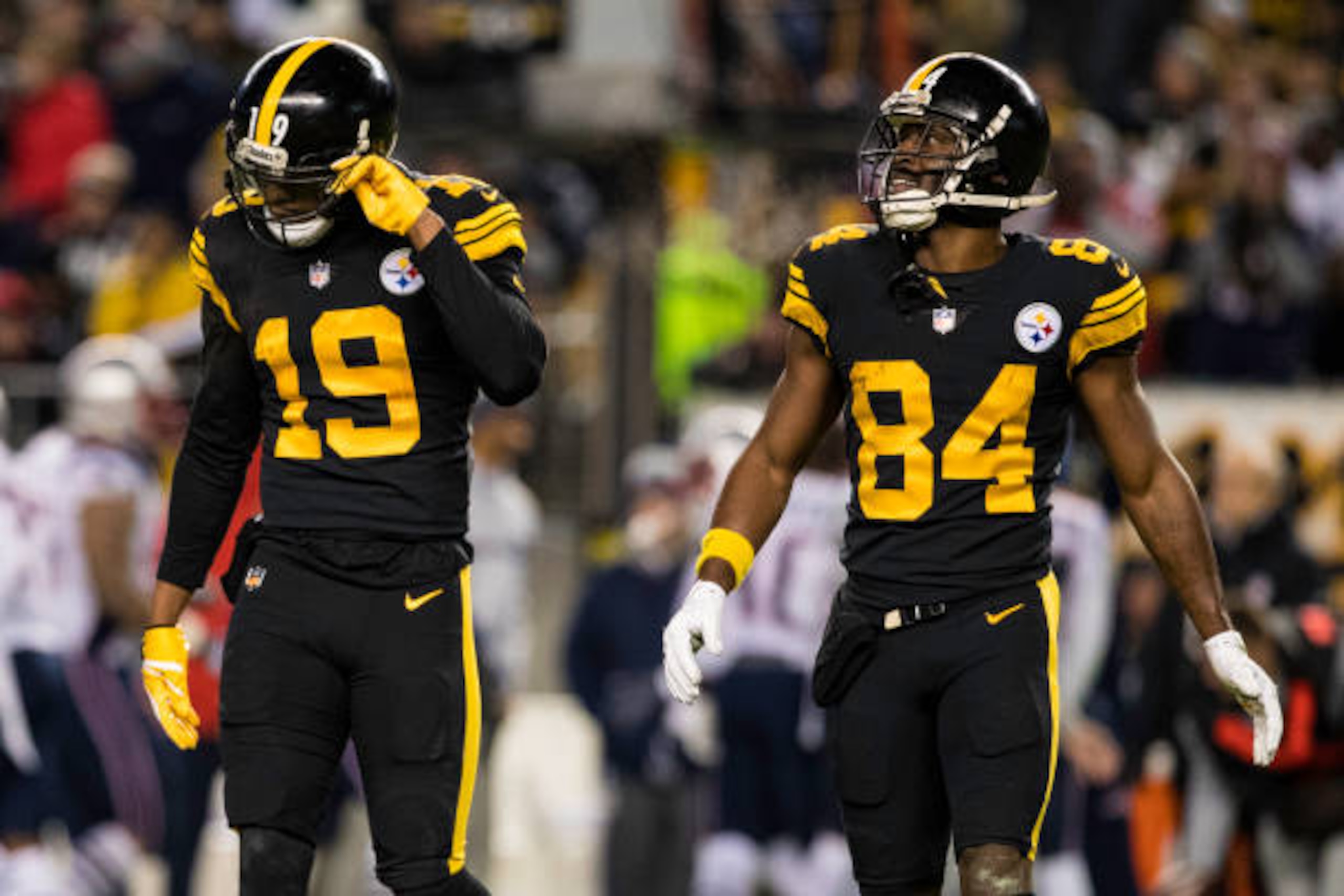 PITTSBURGH, PA -DECEMBER 16: Pittsburgh Steelers wide receiver JuJu Smith-Schuster (19) and Pittsburgh Steelers wide receiver Antonio Brown (84) look on during the NFL football game between the New England Patriots and the Pittsburgh Steelers on December 16, 2018 at Heinz Field in Pittsburgh, PA. (Photo by Mark Alberti/Icon Sportswire via Getty Images)