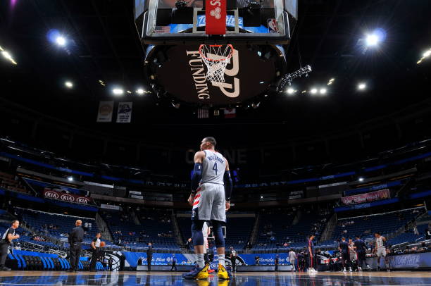 ORLANDO, FL - APRIL 7: Russell Westbrook #4 of the Washington Wizards looks on before the game against the Orlando Magic on April 7, 2021 at Amway Center in Orlando, Florida. NOTE TO USER: User expressly acknowledges and agrees that, by downloading and or using this photograph, User is consenting to the terms and conditions of the Getty Images License Agreement. Mandatory Copyright Notice: Copyright 2021 NBAE (Photo by Fernando Medina/NBAE via Getty Images)