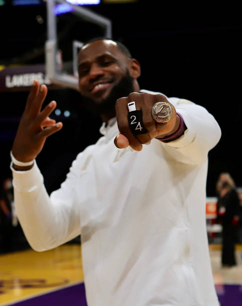 LOS ANGELES, CA - DECEMBER 22: LeBron James #23 of the Los Angeles Lakers shows his Championship rings after the game against the LA Clippers on December 22, 2020 at STAPLES Center in Los Angeles, California. NOTE TO USER: User expressly acknowledges and agrees that, by downloading and/or using this photograph, user is consenting to the terms and conditions of the Getty Images License Agreement.  Mandatory Copyright Notice: Copyright 2020 NBAE (Photo by Jim Poorten/NBAE via Getty Images)