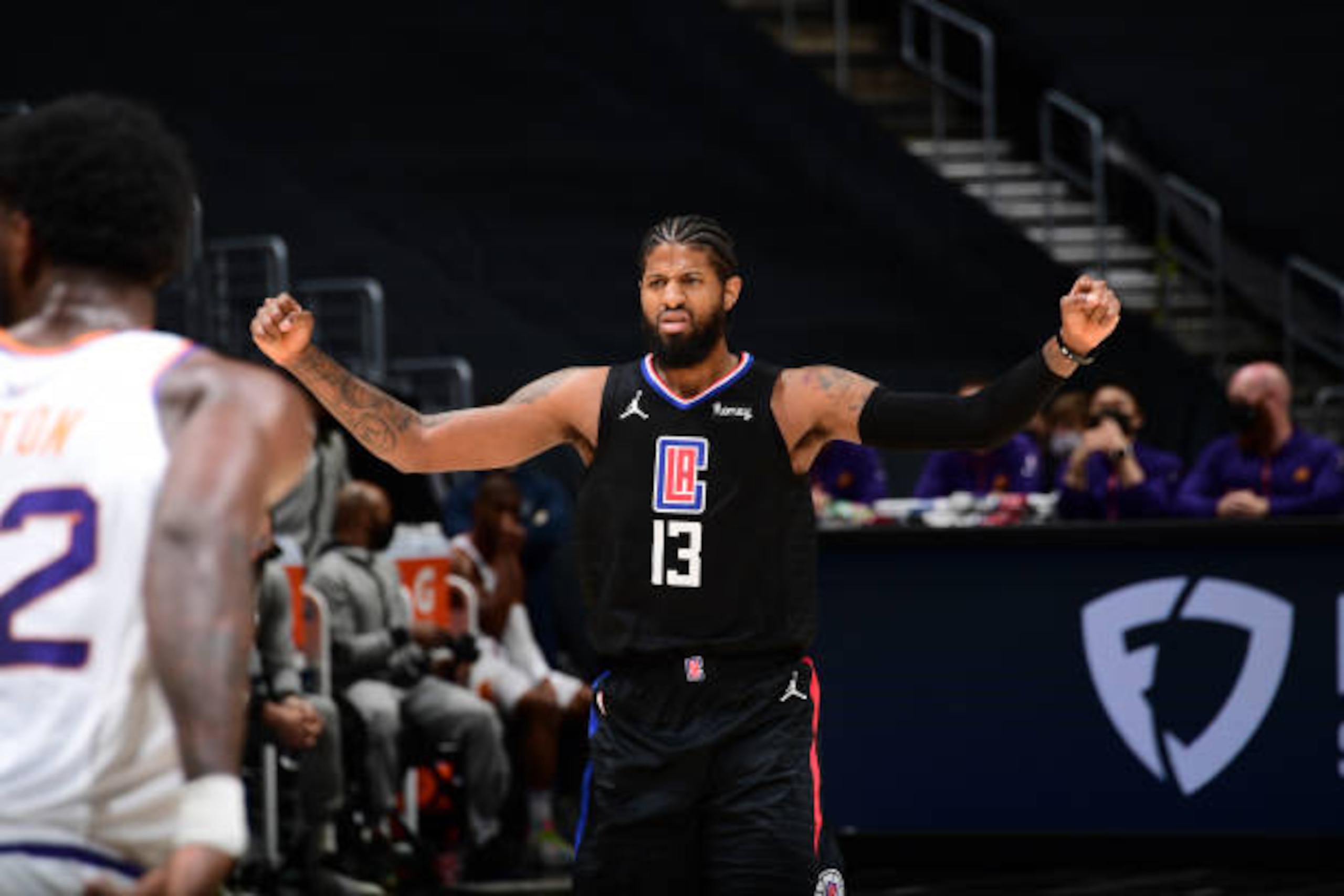 LOS ANGELES, CA - APRIL 8: Paul George #13 of the LA Clippers celebrates during the game against the Phoenix Suns on April 8, 2021 at STAPLES Center in Los Angeles, California. NOTE TO USER: User expressly acknowledges and agrees that, by downloading and/or using this Photograph, user is consenting to the terms and conditions of the Getty Images License Agreement. Mandatory Copyright Notice: Copyright 2021 NBAE (Photo by Adam Pantozzi/NBAE via Getty Images)
