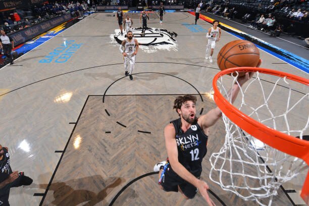 BROOKLYN, NY - APRIL 7: Joe Harris #12 of the Brooklyn Nets shoots the ball against the New Orleans Pelicans on April 7, 2021 at Barclays Center in Brooklyn, New York. NOTE TO USER: User expressly acknowledges and agrees that, by downloading and/or using this Photograph, user is consenting to the terms and conditions of the Getty Images License Agreement. Mandatory Copyright Notice: Copyright 2021 NBAE (Photo by Jesse D. Garrabrant/NBAE via Getty Images)