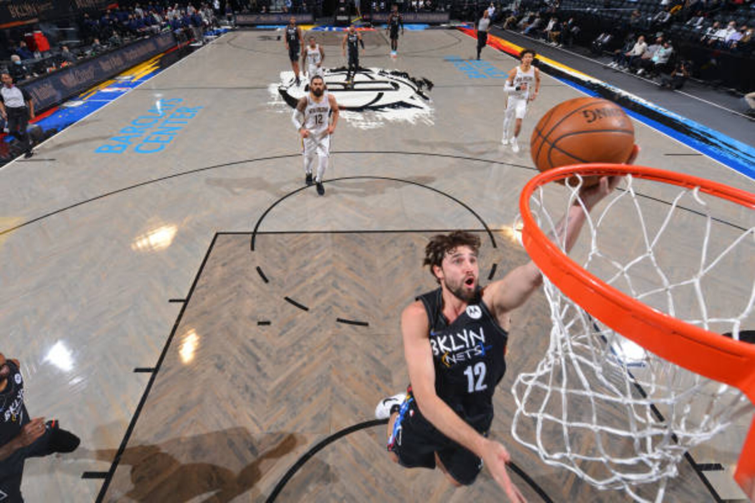 BROOKLYN, NY - APRIL 7: Joe Harris #12 of the Brooklyn Nets shoots the ball against the New Orleans Pelicans on April 7, 2021 at Barclays Center in Brooklyn, New York. NOTE TO USER: User expressly acknowledges and agrees that, by downloading and/or using this Photograph, user is consenting to the terms and conditions of the Getty Images License Agreement. Mandatory Copyright Notice: Copyright 2021 NBAE (Photo by Jesse D. Garrabrant/NBAE via Getty Images)