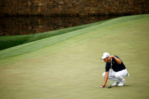 AUGUSTA, GEORGIA - APRIL 09: Si Woo Kim of South Korea lines up a putt \during the second round of the Masters at Augusta National Golf Club on April 09, 2021 in Augusta, Georgia. (Photo by Jared C. Tilton/Getty Images)