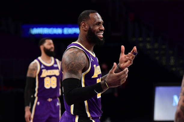 LOS ANGELES, CA - MARCH 18: LeBron James #23 of the Los Angeles Lakers smiles during the game against the Charlotte Hornets on March 18, 2021 at STAPLES Center in Los Angeles, California. NOTE TO USER: User expressly acknowledges and agrees that, by downloading and/or using this Photograph, user is consenting to the terms and conditions of the Getty Images License Agreement. Mandatory Copyright Notice: Copyright 2021 NBAE (Photo by Adam Pantozzi/NBAE via Getty Images)
