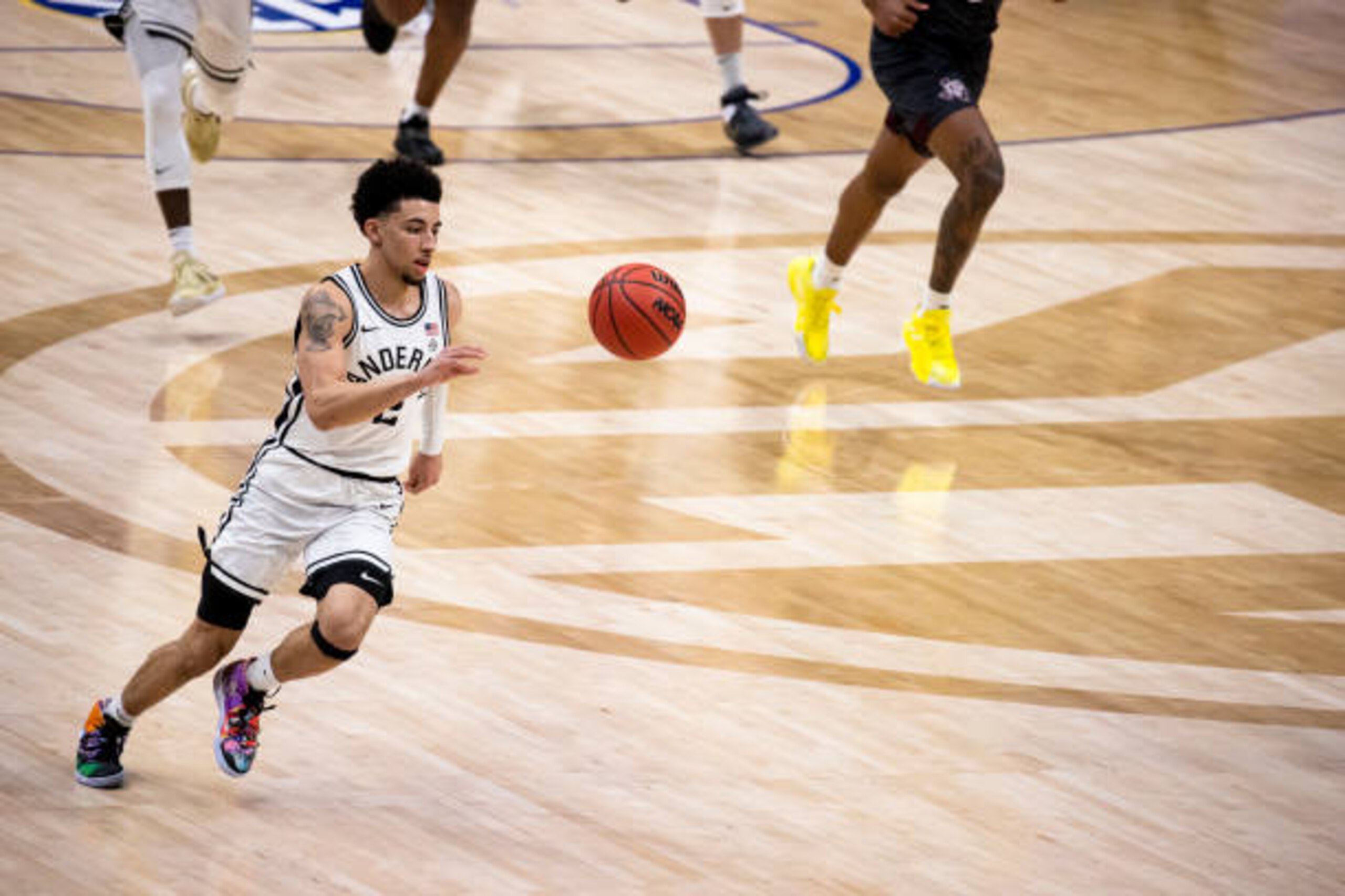 NASHVILLE, TN - MARCH 10:  Scotty Pippen Jr. #2 of the Vanderbilt Commodores drives to the basket against the Texas A&M Aggies during the second half at Bridgestone Arena on March 10, 2021 in Nashville, Tennessee. (Photo by Brett Carlsen/Getty Images)