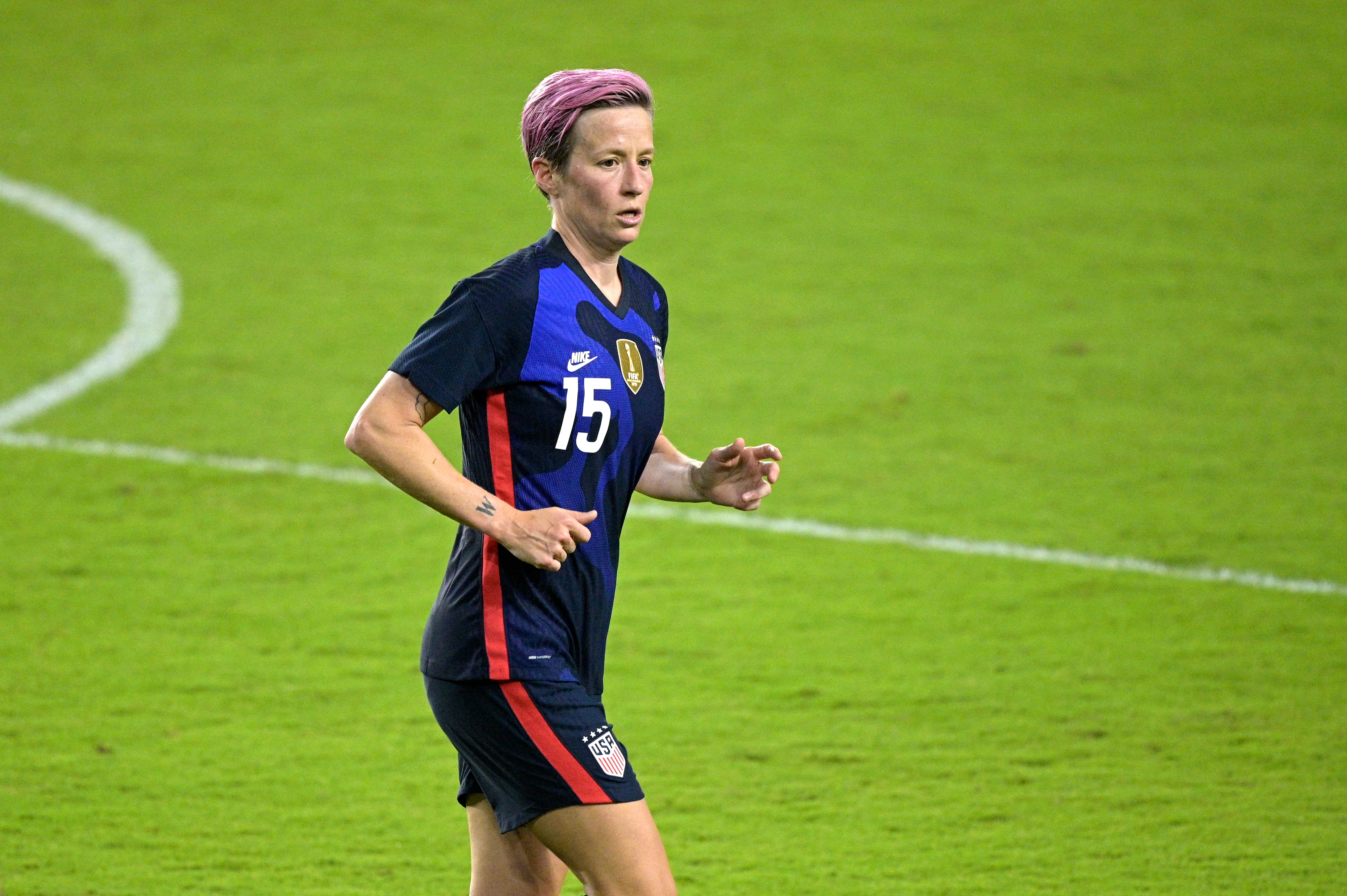 United States forward Megan Rapinoe (15) follows a play during the second half of a SheBelieves Cup women's soccer match against Argentina, Wednesday, Feb. 24, 2021, in Orlando, Fla. (AP Photo/Phelan M. Ebenhack)