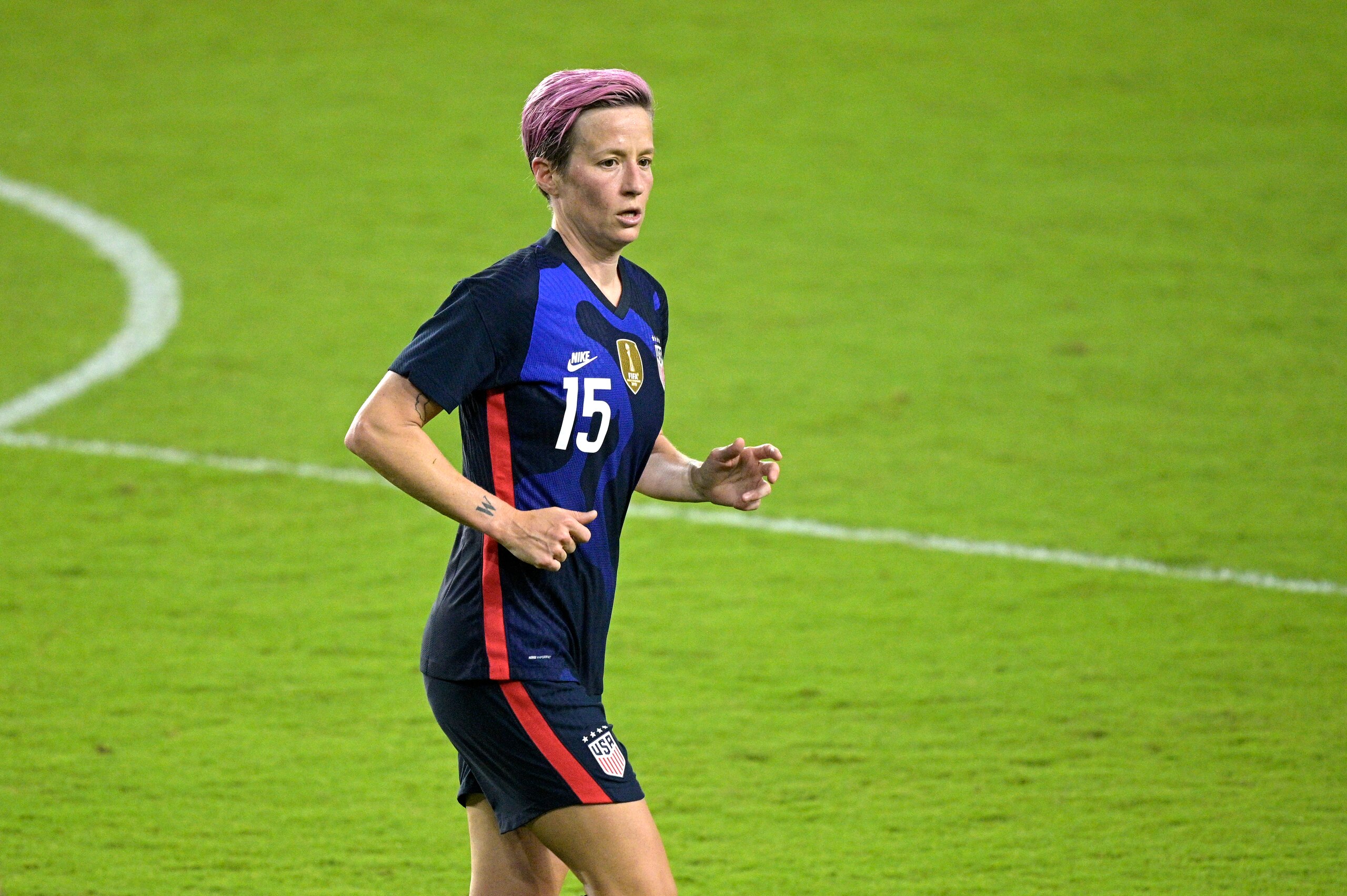 United States forward Megan Rapinoe (15) follows a play during the second half of a SheBelieves Cup women's soccer match against Argentina, Wednesday, Feb. 24, 2021, in Orlando, Fla. (AP Photo/Phelan M. Ebenhack)
